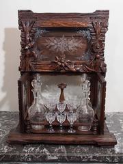 Black Forest Cave a Liquor with Carved Chickens