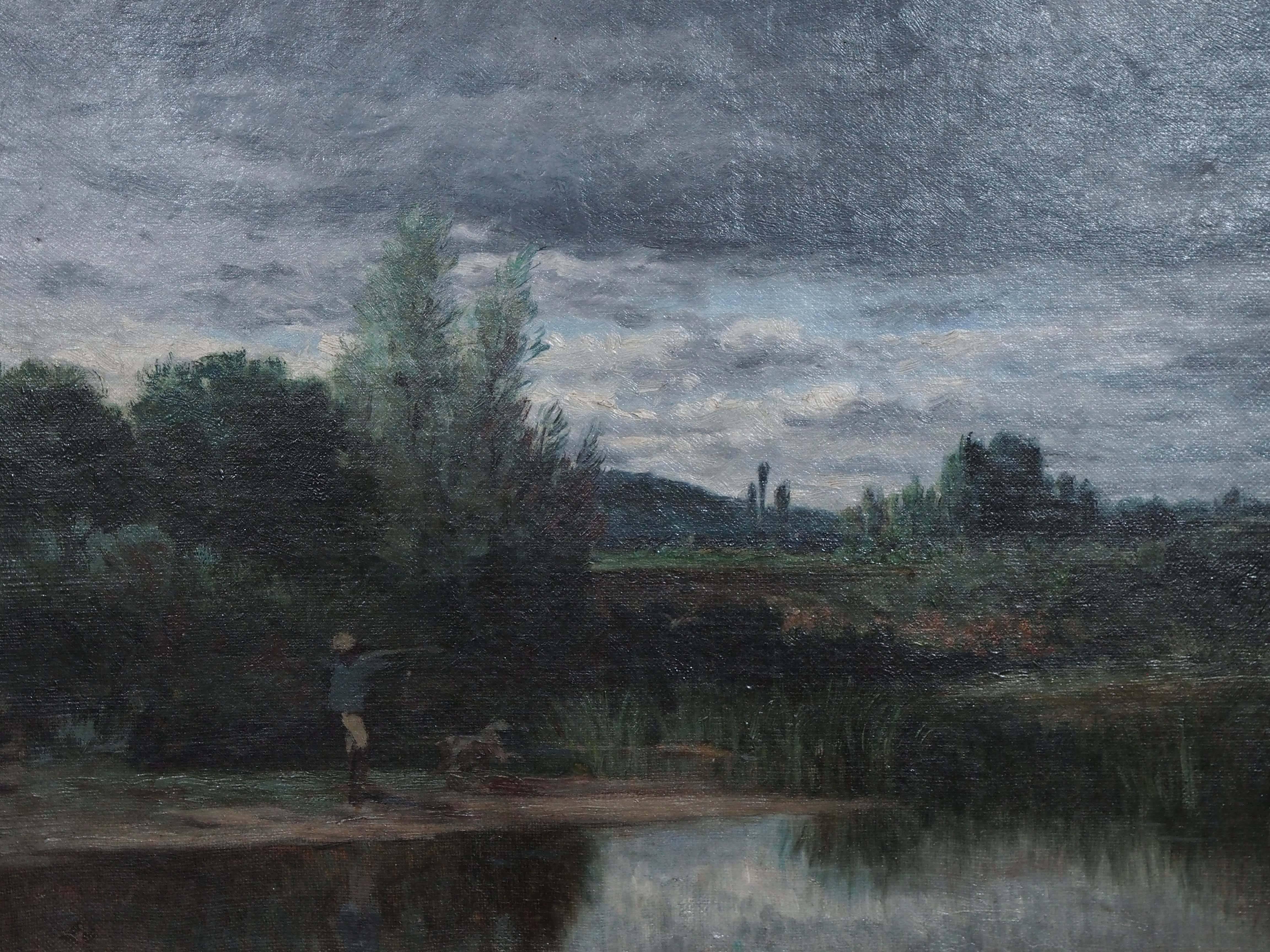19th century French Barbizon school oil on canvas. View of a river bend with fisherman and dog. In period gilt frame.
Image size is 15.5 W x 11.5 H without frame.