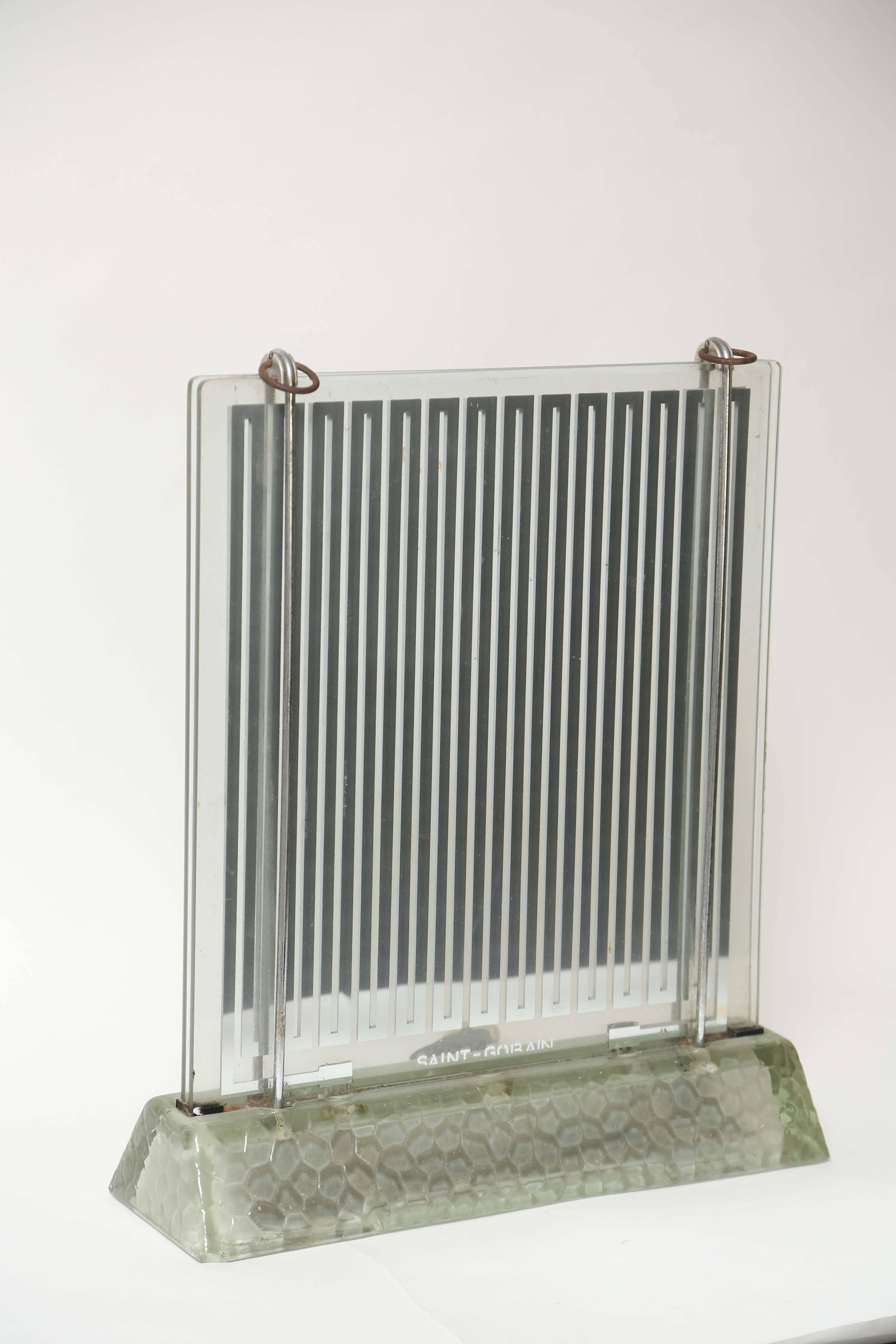 French architect Rene-Andre Coulon (1908-1997) designed this electric heater using metal tape between two sheets of glass. 





                              