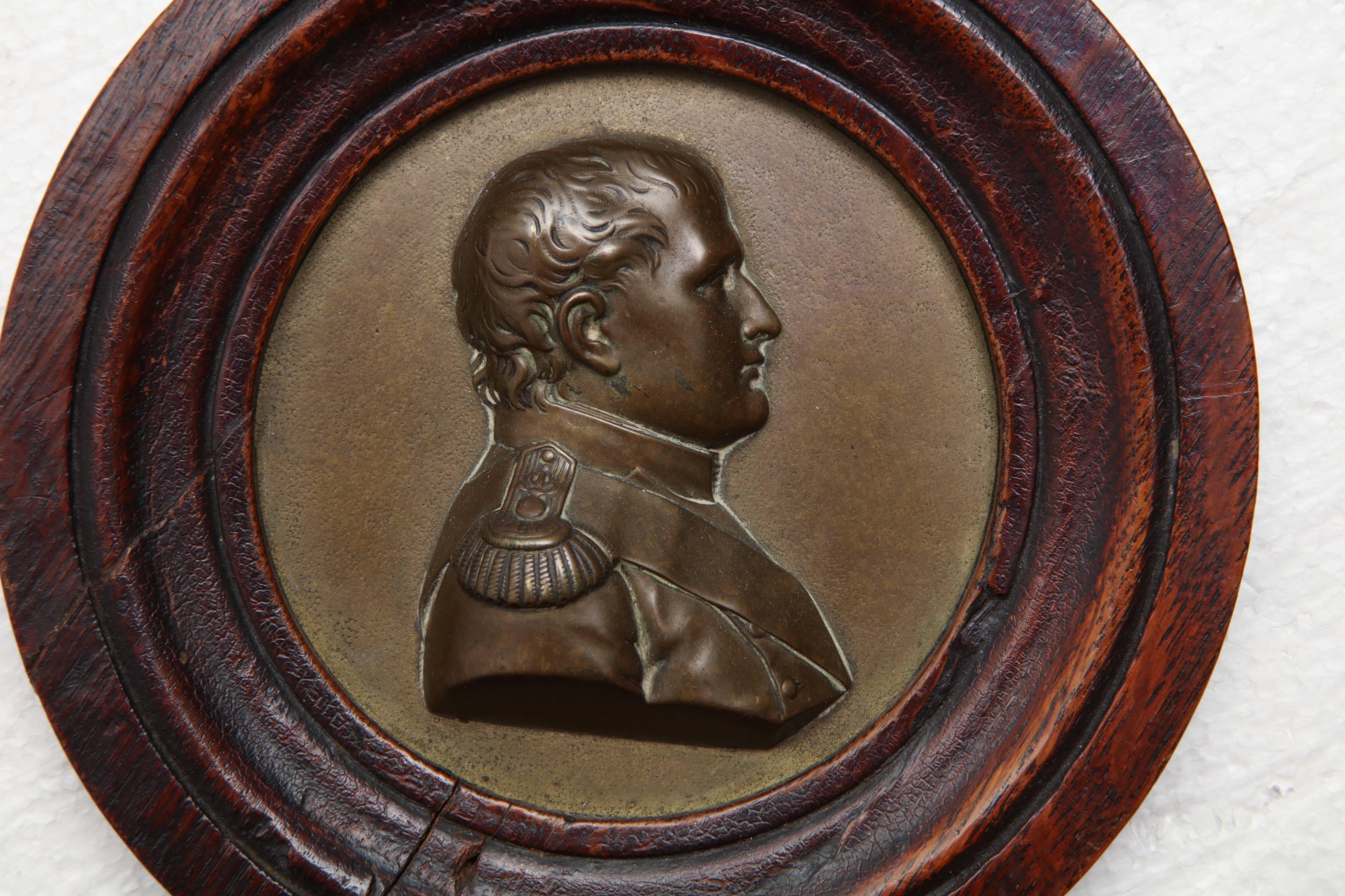 Mid-19th century bronze portrait plaque of Napoleon in oak frame.