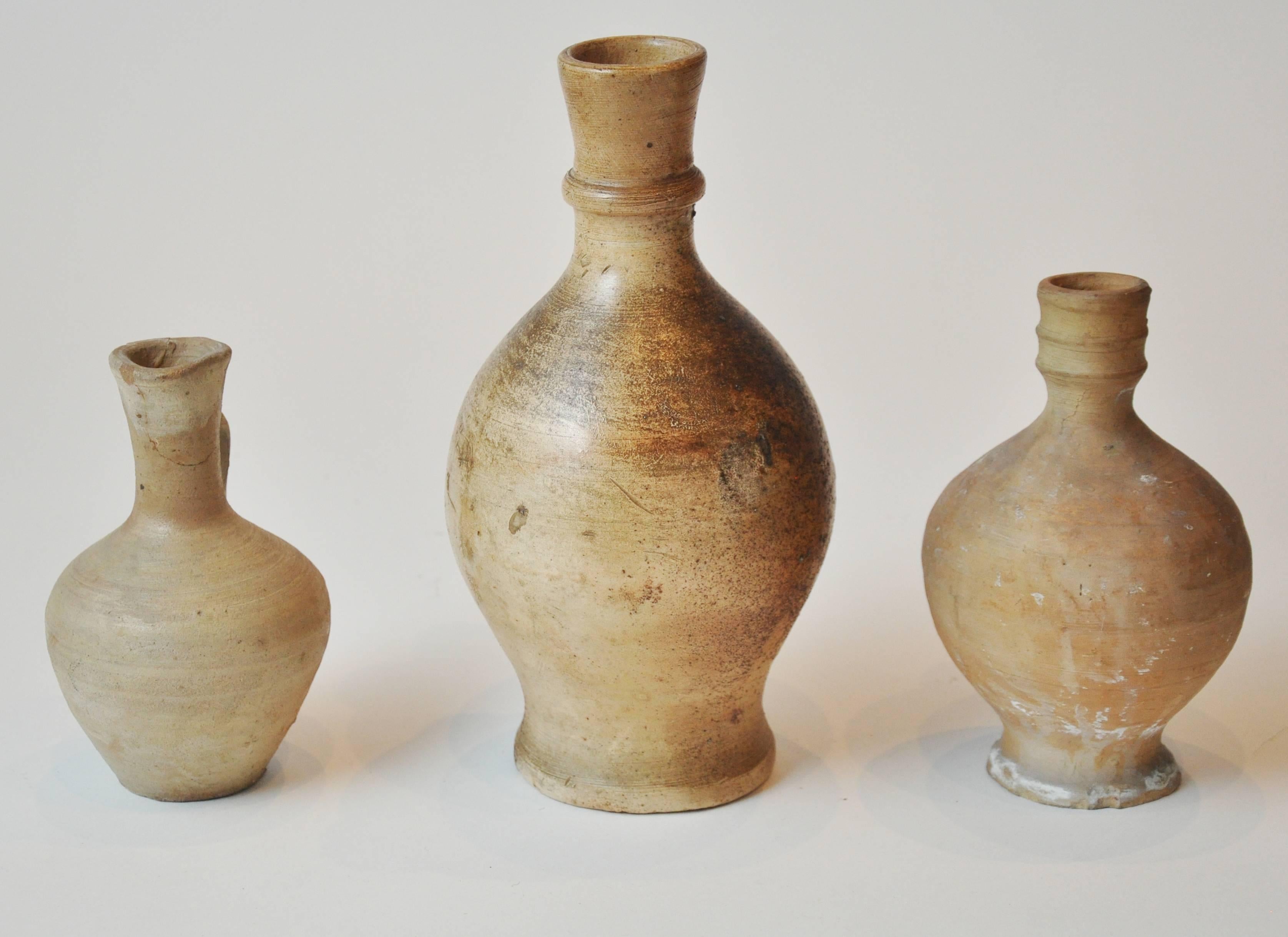 Early 20th Century Clay Pitcher Collection 1