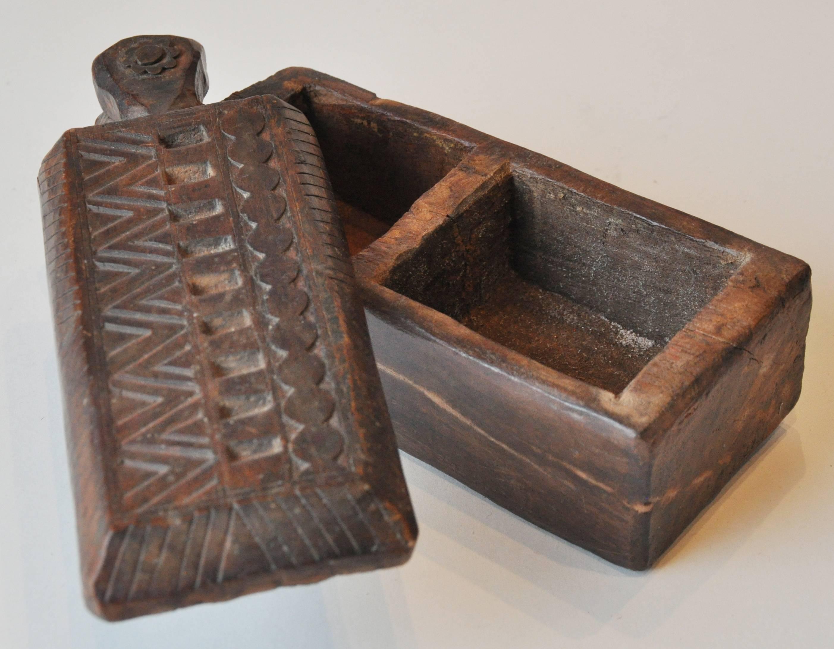 19th century India Rajasthan spice box. Wooden hand-carved with hinged top pivots to open to two compartments. 

