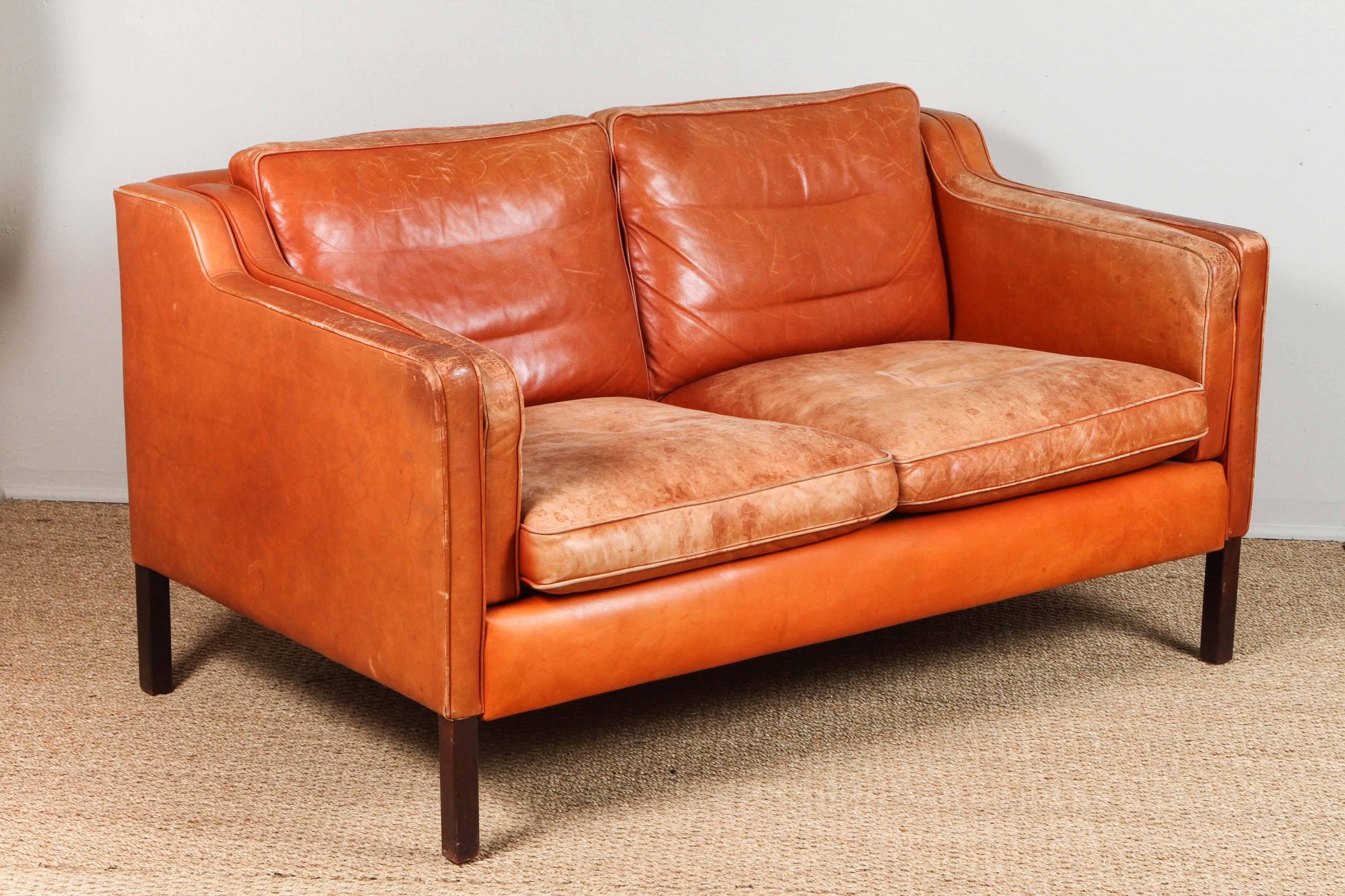 burnt orange leather loveseat