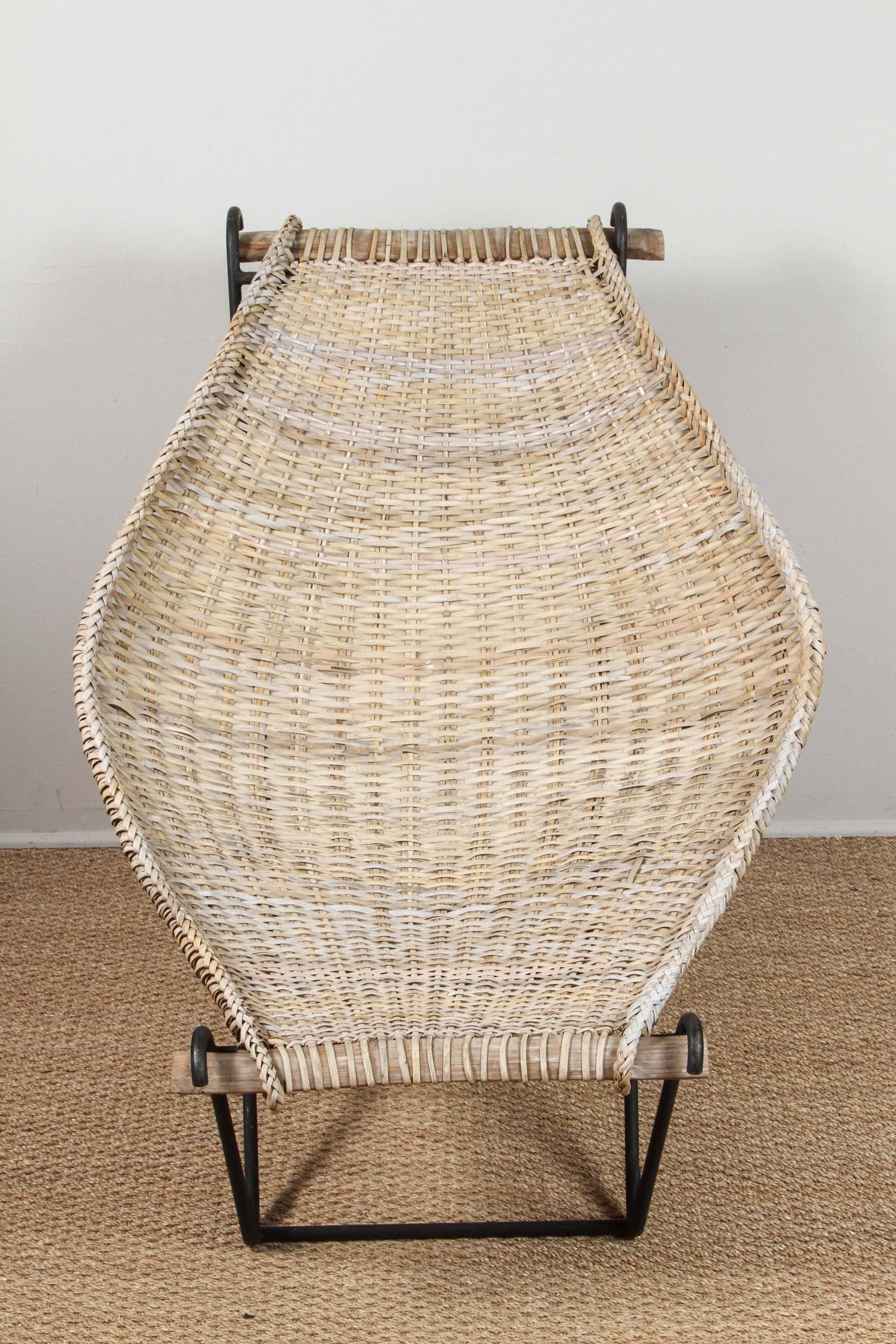 Vintage John Risley chair. 90% original rattan with contemporary rattan added for extra strength.