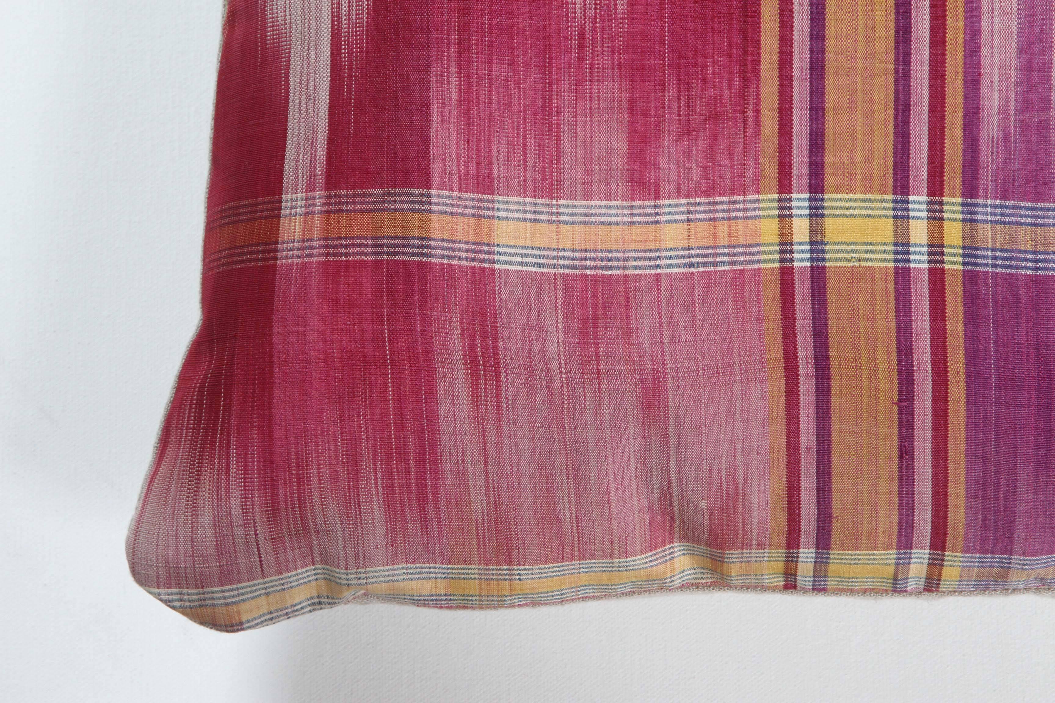 Vintage tie-dyed weft Ikat silk pillow. Finely woven with rich color palette. This pillow has a natural linen back, invisible zipper and feather and down fill.