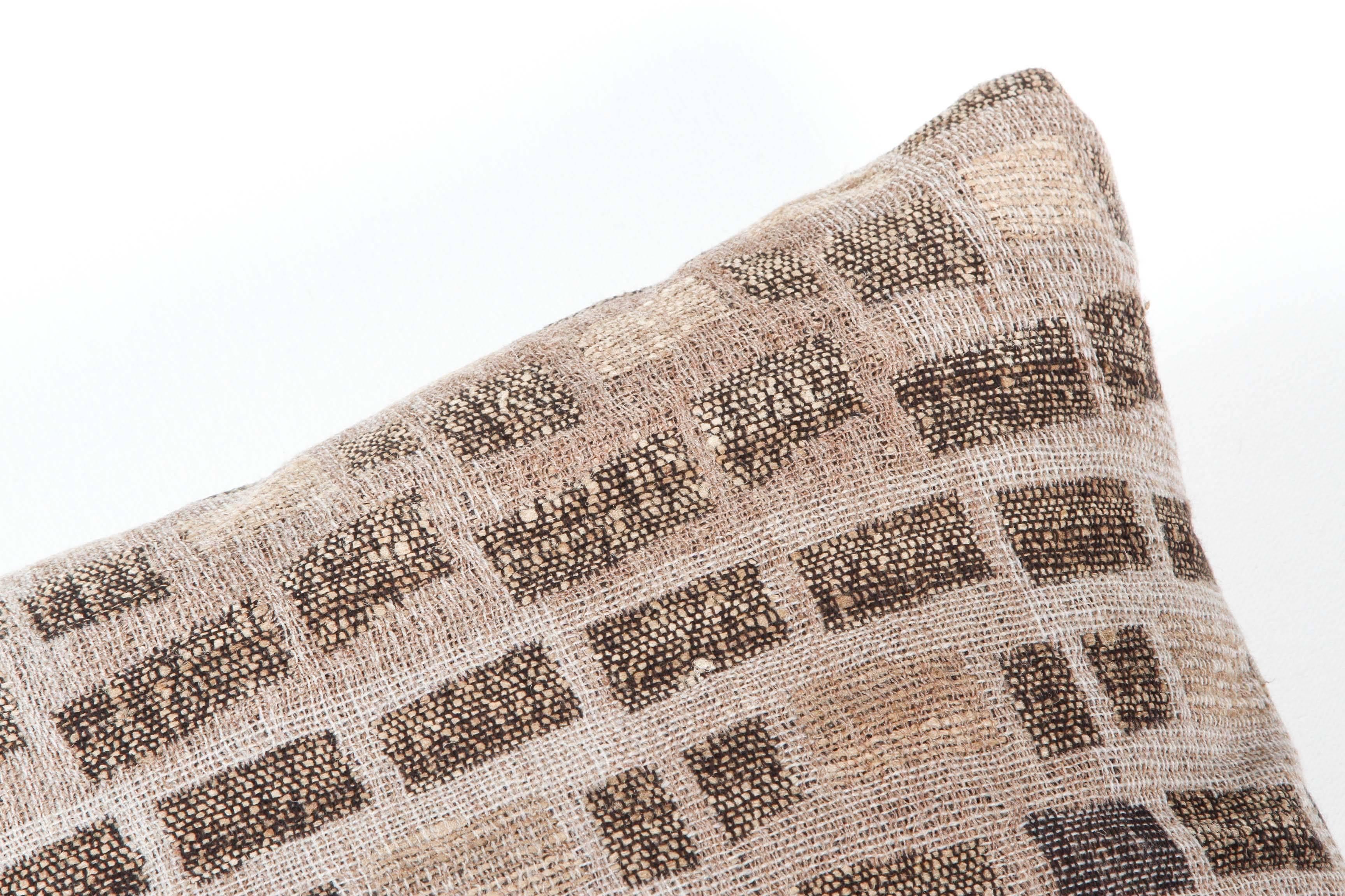 A contemporary line of cushions, pillows, throws, bedcovers, bedspreads and yardage hand woven in India on antique Jacquard looms. Handspun wool, cotton, linen, and raw silk give the textiles an appealing uneven quality.

This wool and raw Tussar