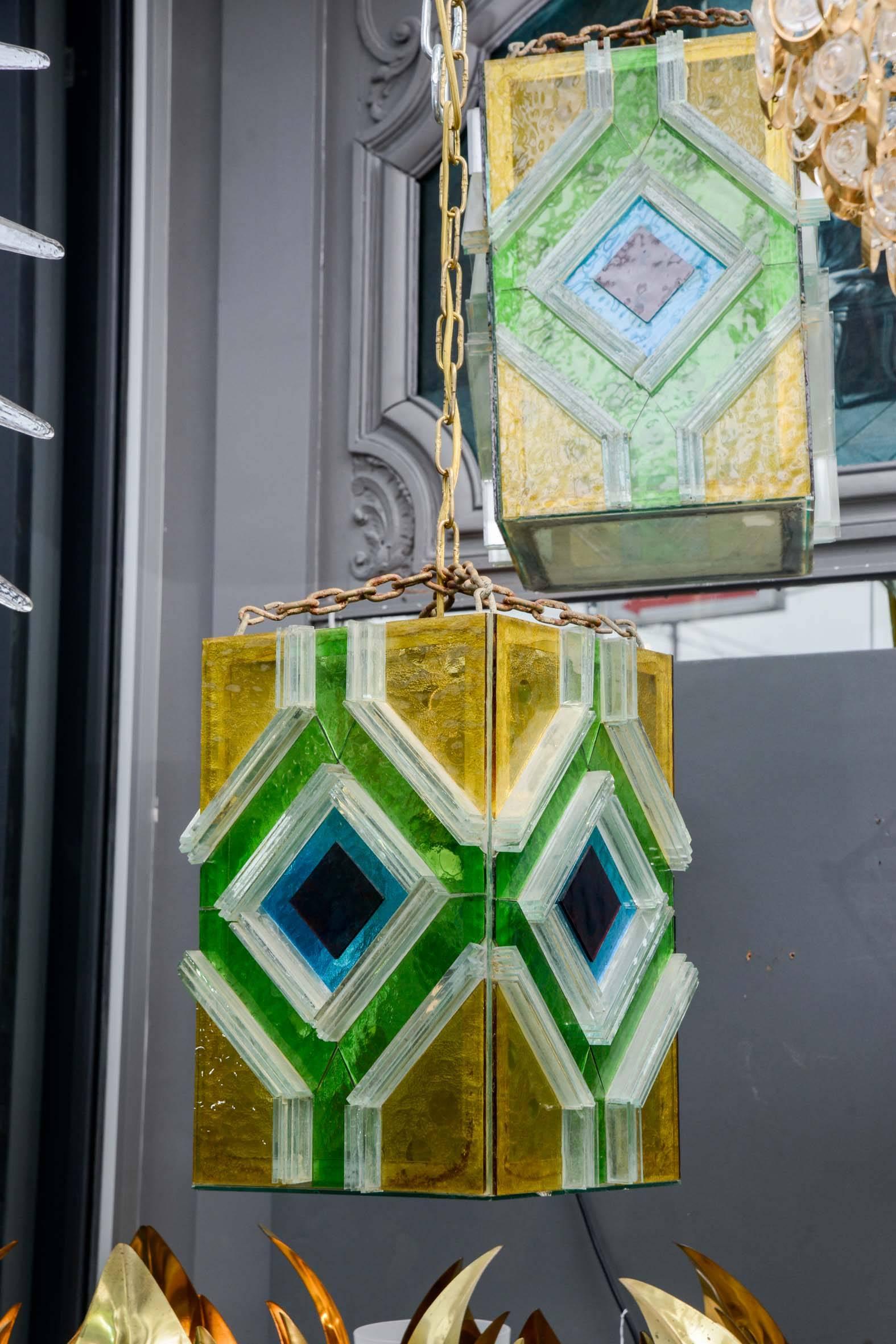 Pair of nice square lanterns made of colored glass symmetric marqueterie.