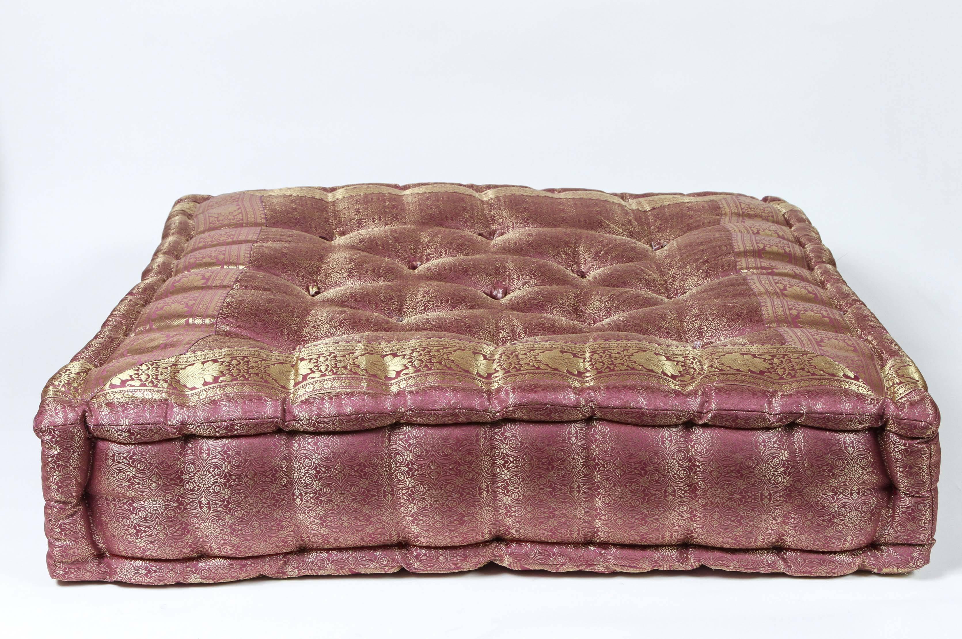 Oversized silk square mauve and gold tufted floor seat yoga pillow.
Handcrafted from silk sari fabric, these floor seat cushions are great to use in kids room or around your yoga Bohemian or Moroccan room or for your beloved pet.
Mahjong style