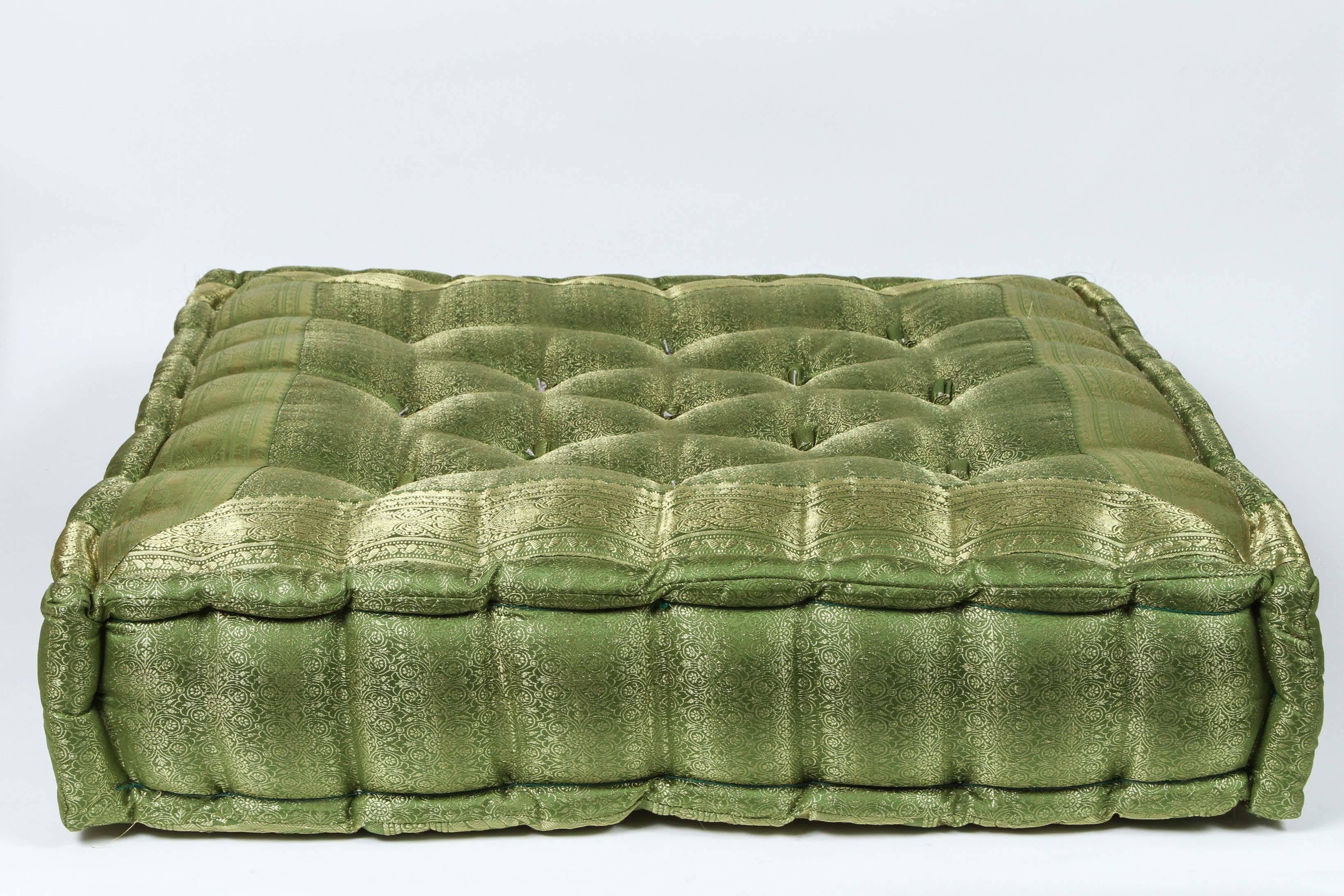 Oversized silk square green tufted floor pillow cushion.
Handcrafted from silk sari fabric, these floor seat cushions are great to use in kids room or around your yoga Bohemian or Moroccan room or for your pet.
Mah Jong style hand-sewn rolled edge,