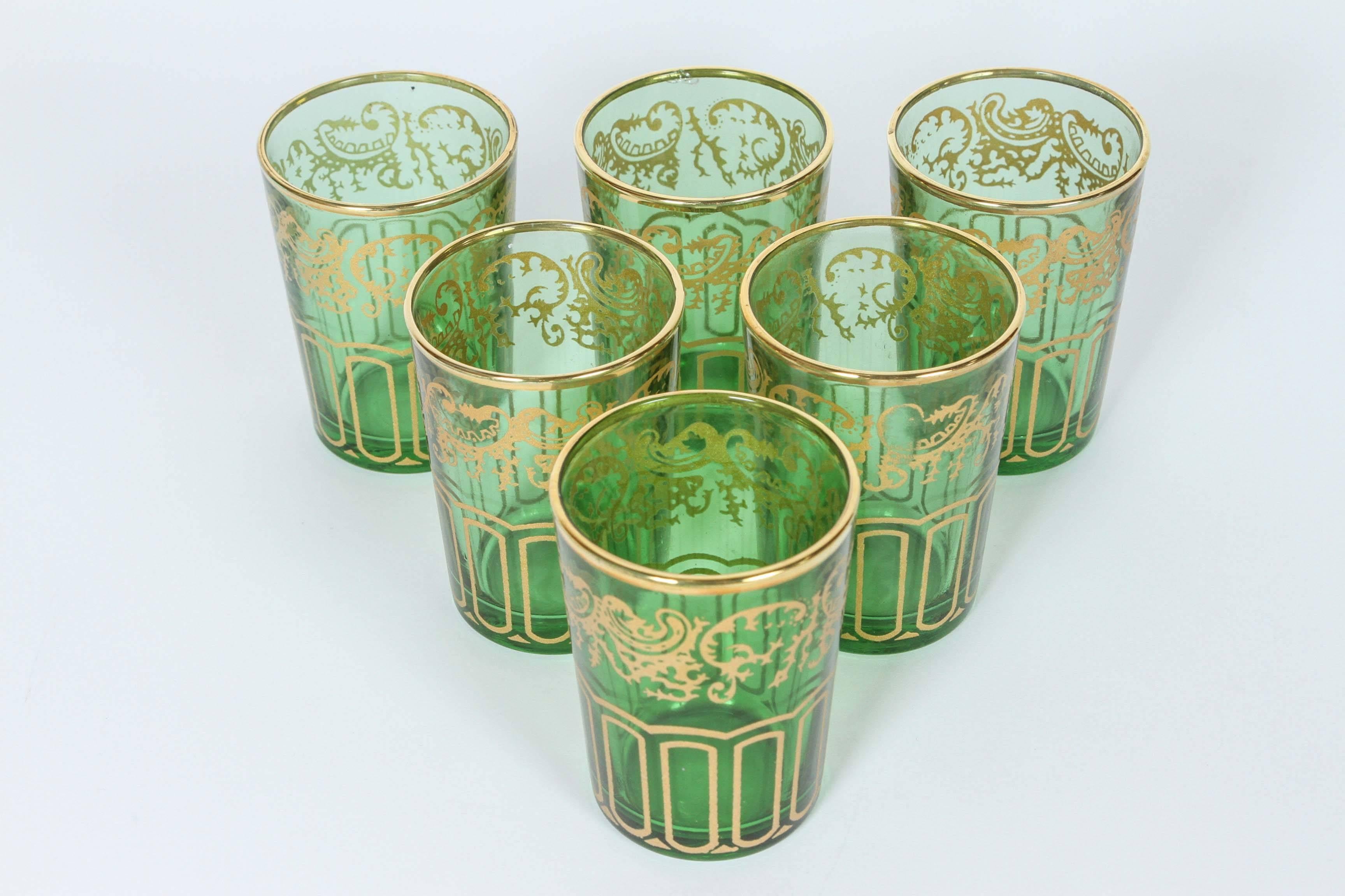 Set of six green and gold Moorish glasses. Handcrafted in Morocco.
Use them for Moroccan tea, or any hot or cold drink.
Multiple sets available.
New in box, old stock.
 