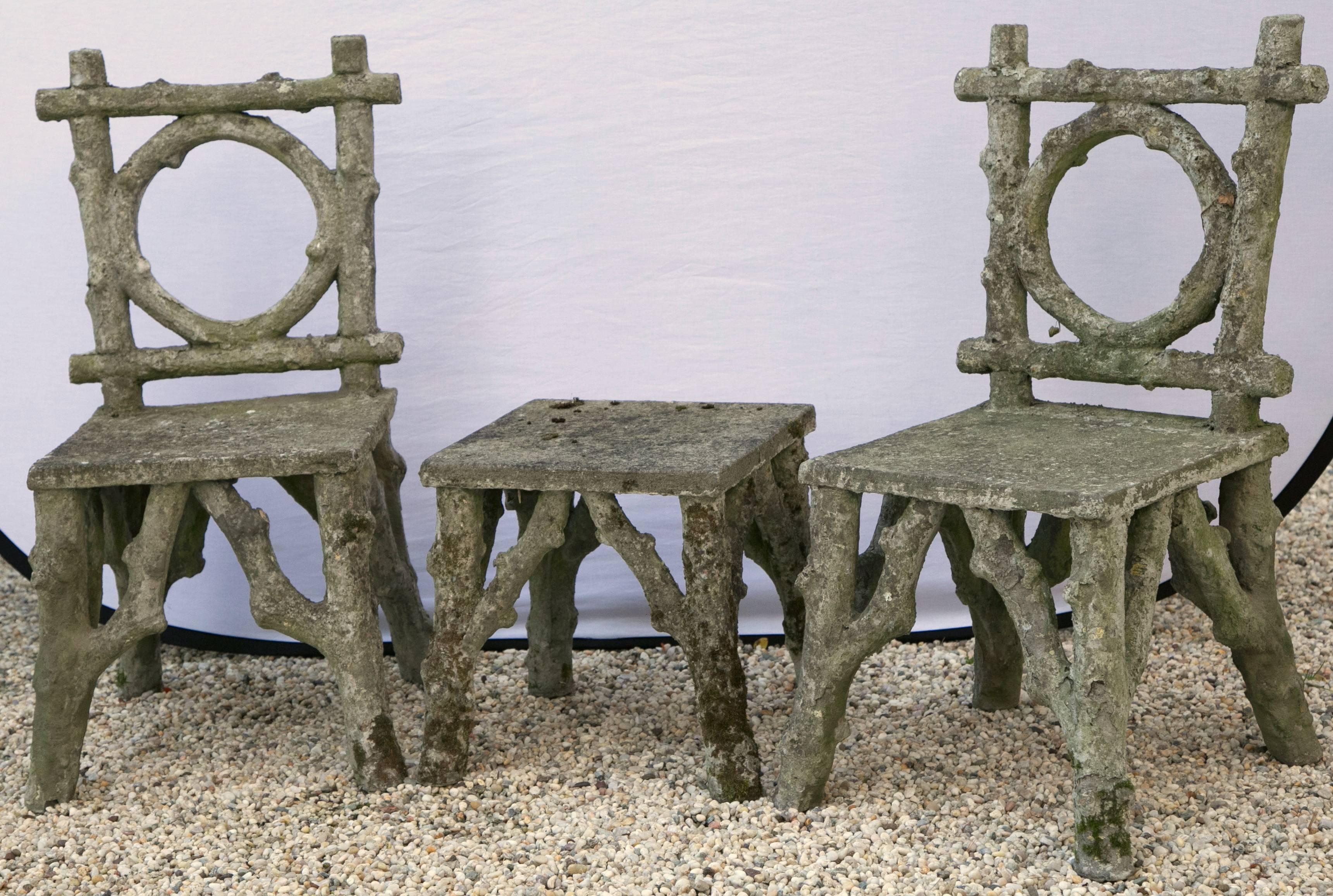Charming two chair and table faux bois set.