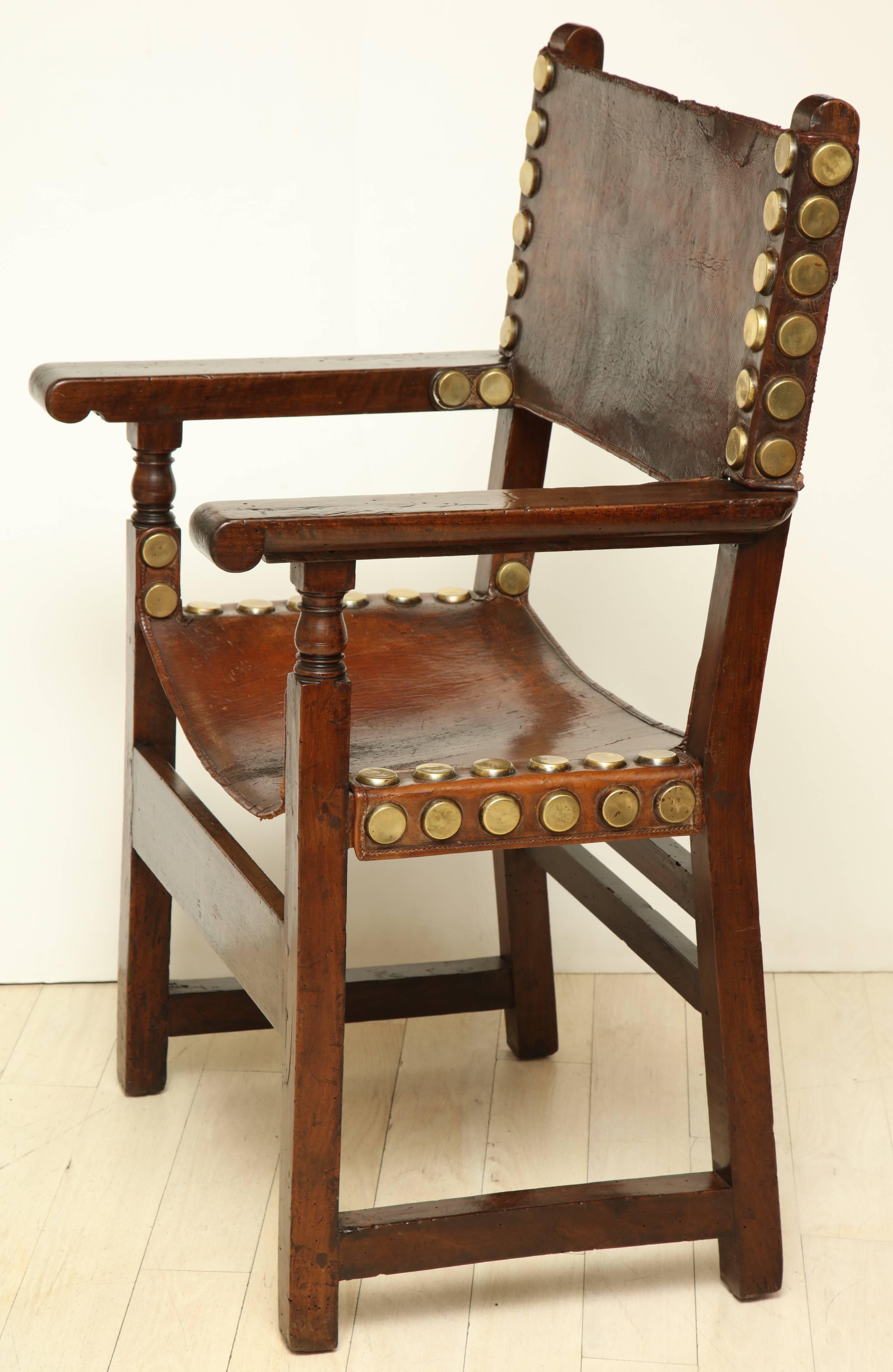 17th Century Spanish Walnut and Leather Armchair with Oversized Brass Nailheads In Good Condition In New York, NY