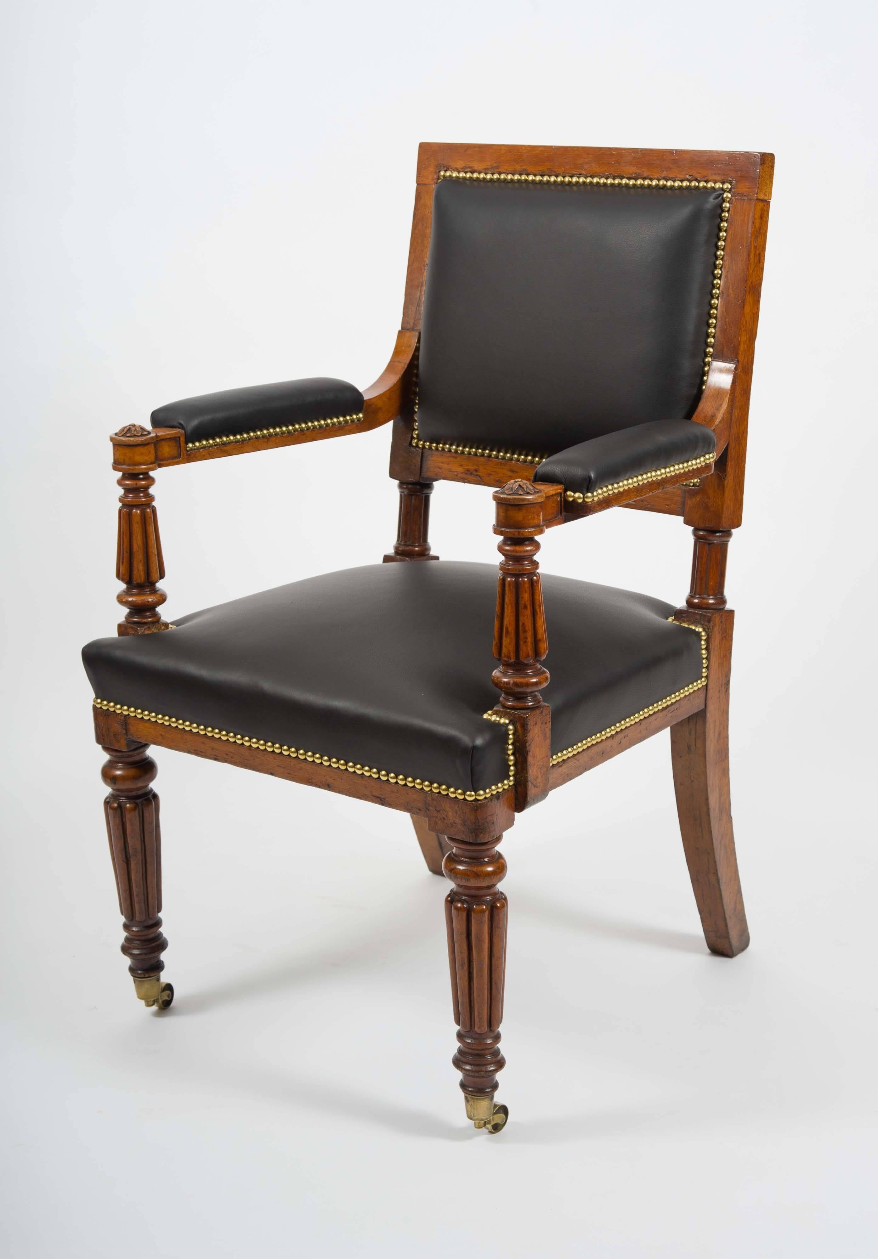 19th Century Pair of English Oak Elbow Chairs on Reeded Legs