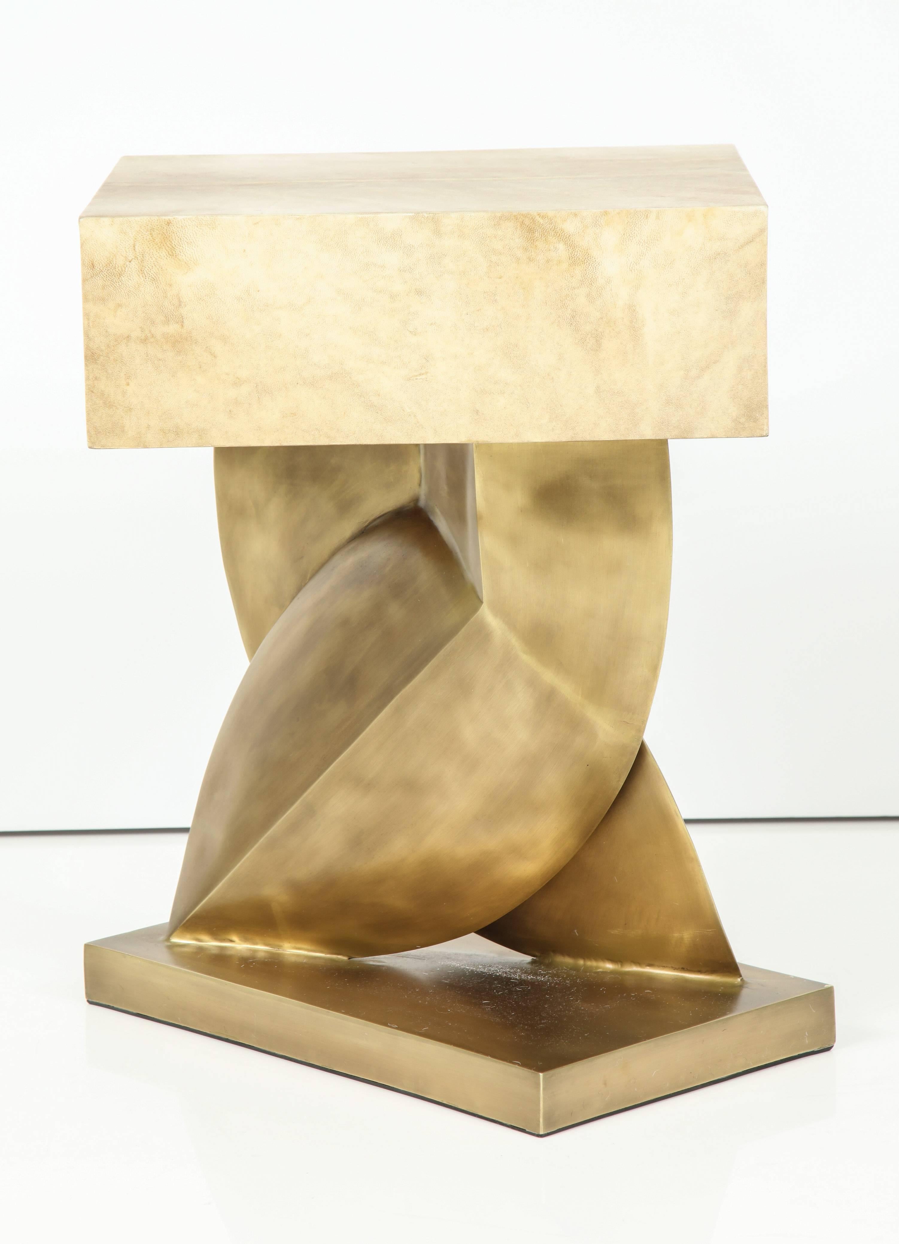 Tan goatskin parchment side table with a fantastic bronze base. Designed in France.
We have the table in stock.
 