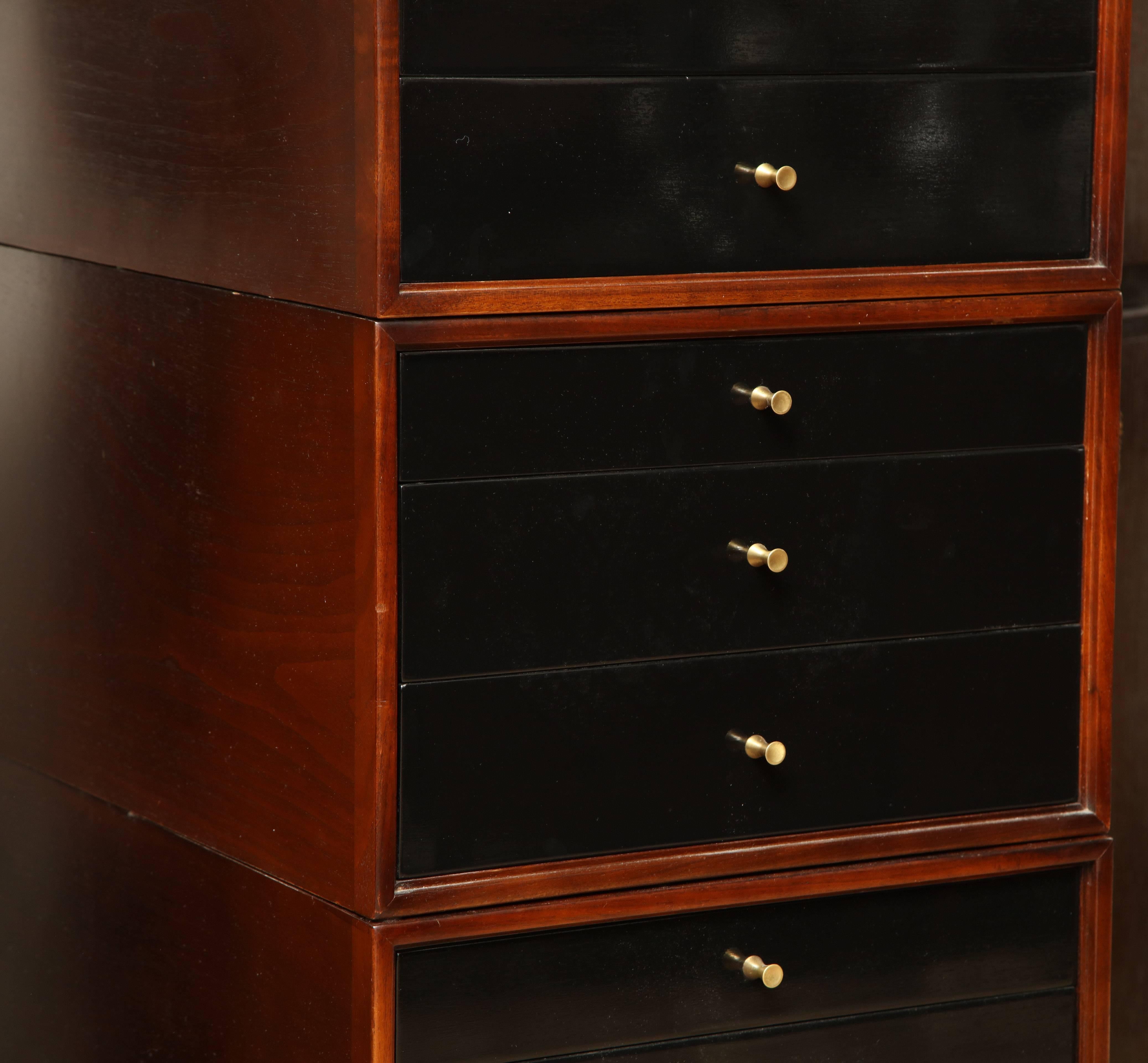 Modular nine-drawer chest in three parts by Mount Airy Furniture circa 1960 - sable finished with ebonized drawer fronts.