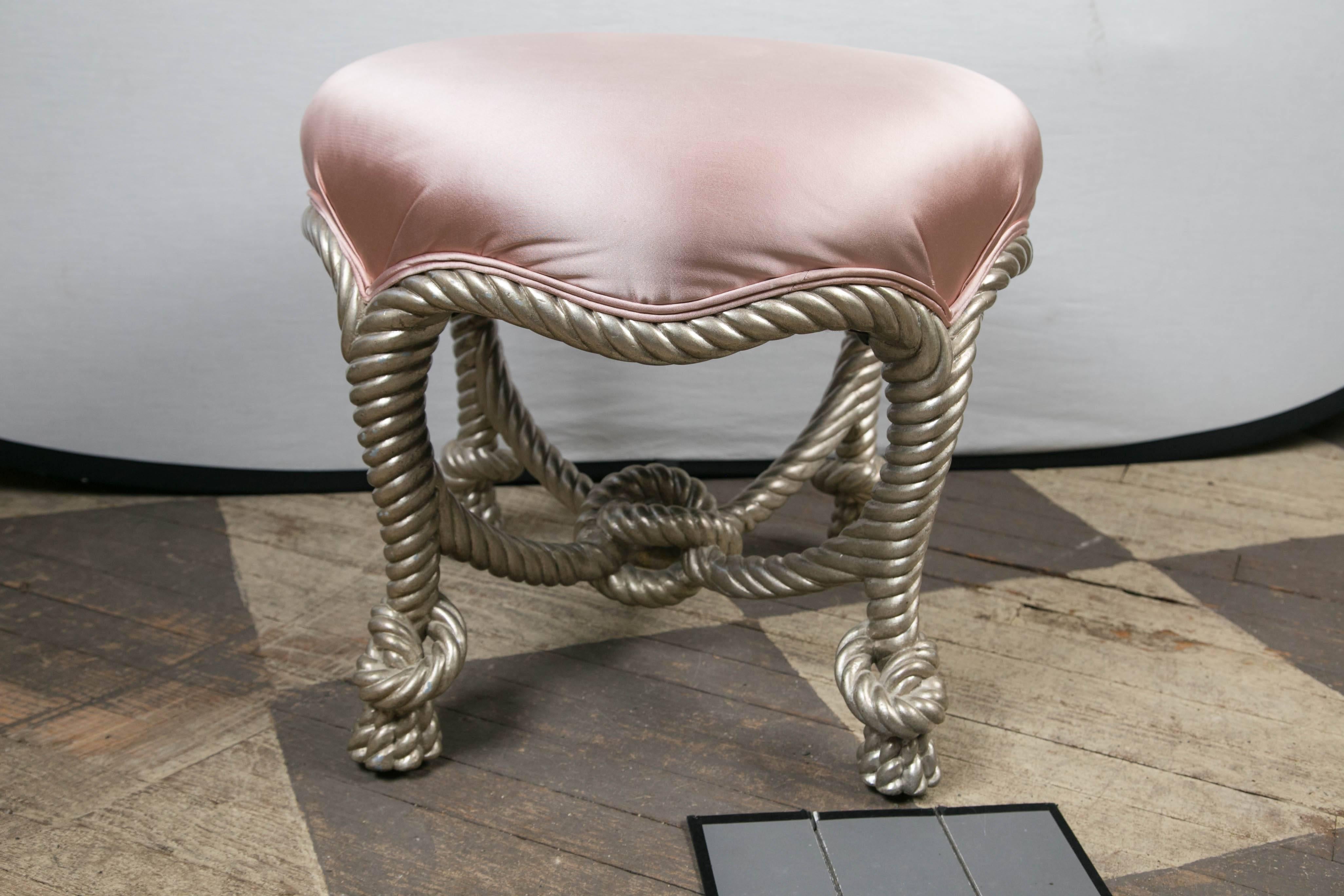 Carved and silvered wood stools with knotted cross stretcher and legs.
Now upholstered in pink satin.
Shipping charges are approximates.