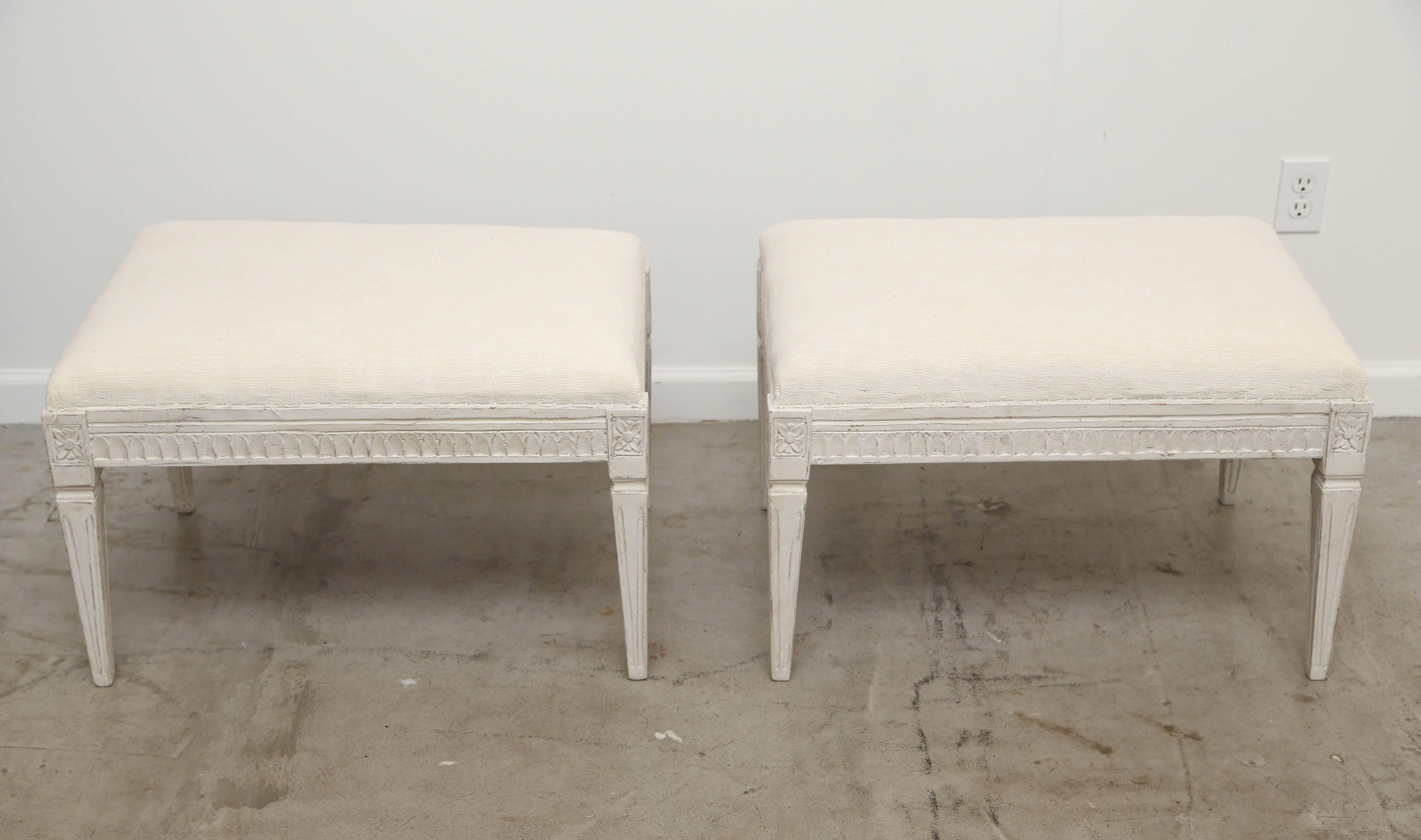 Pair of antique Swedish Gustavian Style painted benches late 19th century
Lambs tongue cared border and rosettes at top of legs below the upholstered
top, fluted tapered legs. Painted in Swedish distressed white finish.




Measures: 27.50 in W x