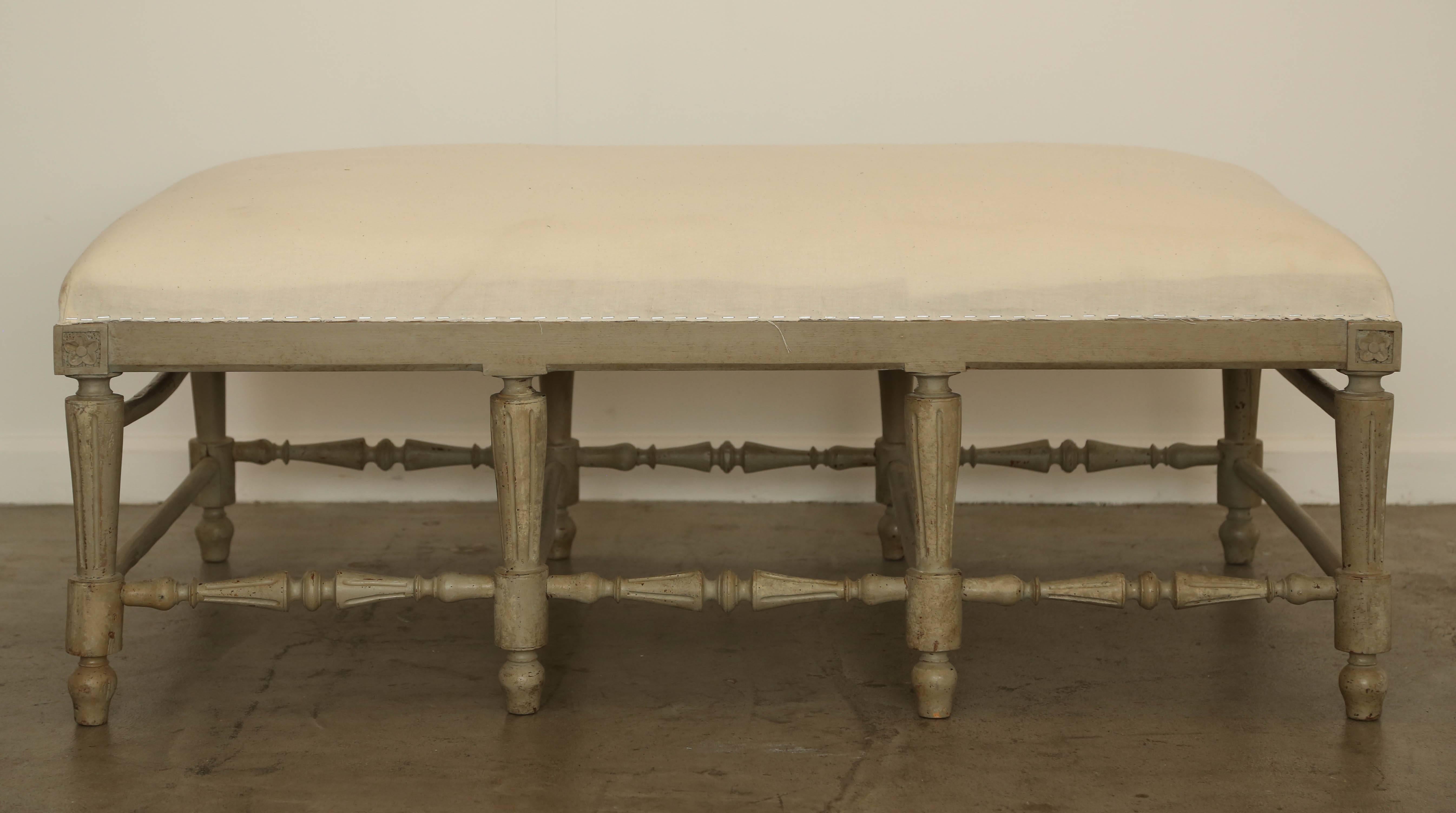 Antique Swedish Gustavian Style large rectangular bench, mid-19th century
Painted in distressed greyish-green finish, fluted and straight tapered legs with
cross stretchers some round straight shape and some turned and carved, top is
upholstered