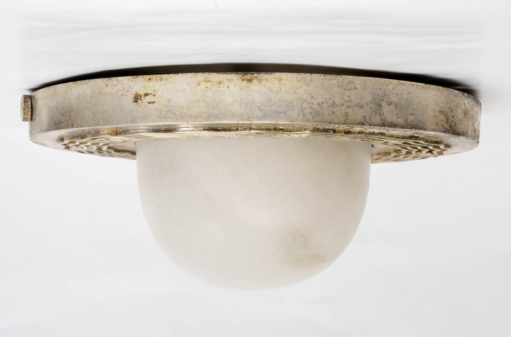 Pair of French Art Deco ceiling lights in silve plated bronze by Genet & Michon.
Undulations decor. Bowl in alabaster.
Model of Emile-Jacques Ruhlmann.
circa 1930.
More images available upon request.
