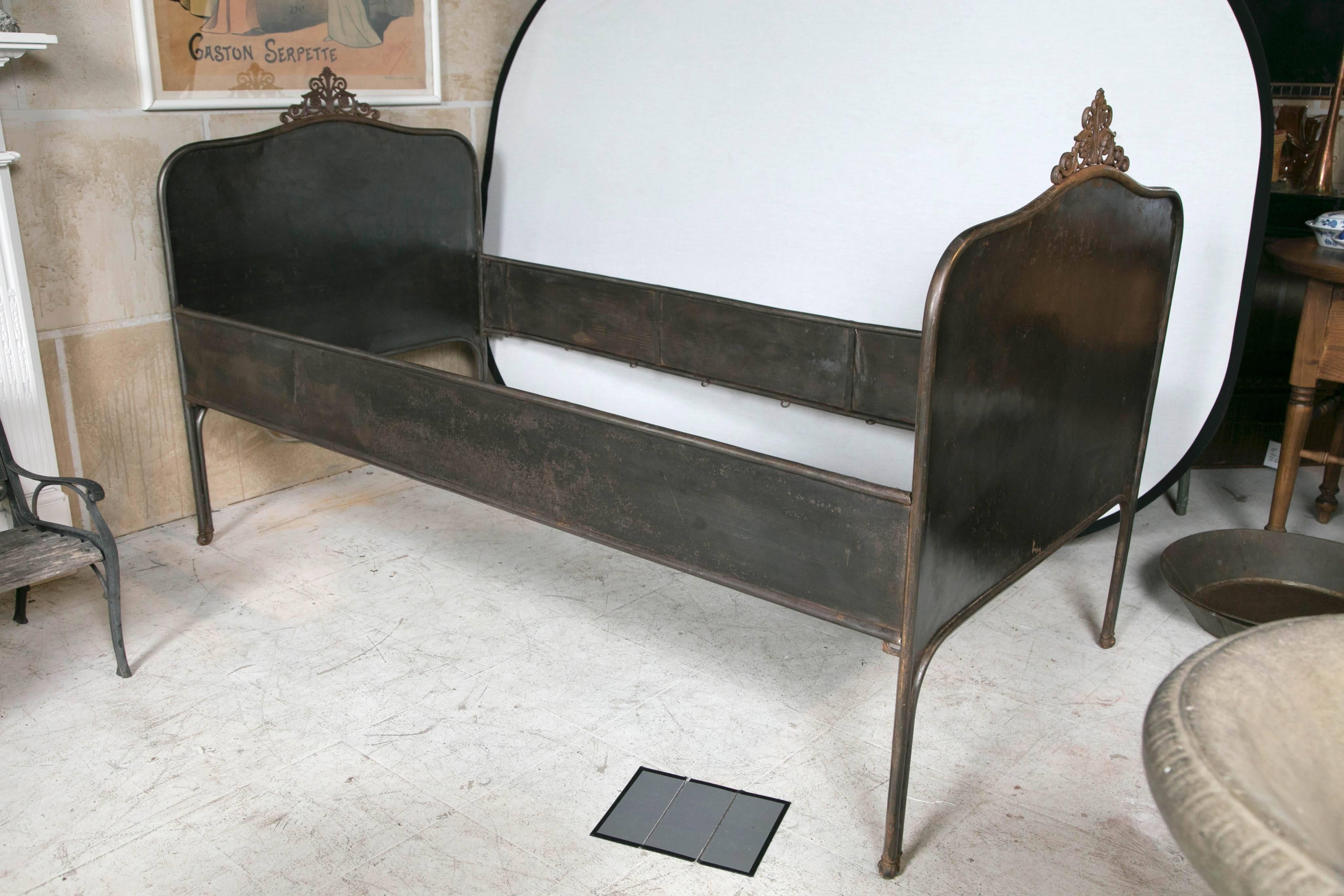 Beautiful pair of French iron bedsteads twin size stripped and waxed.