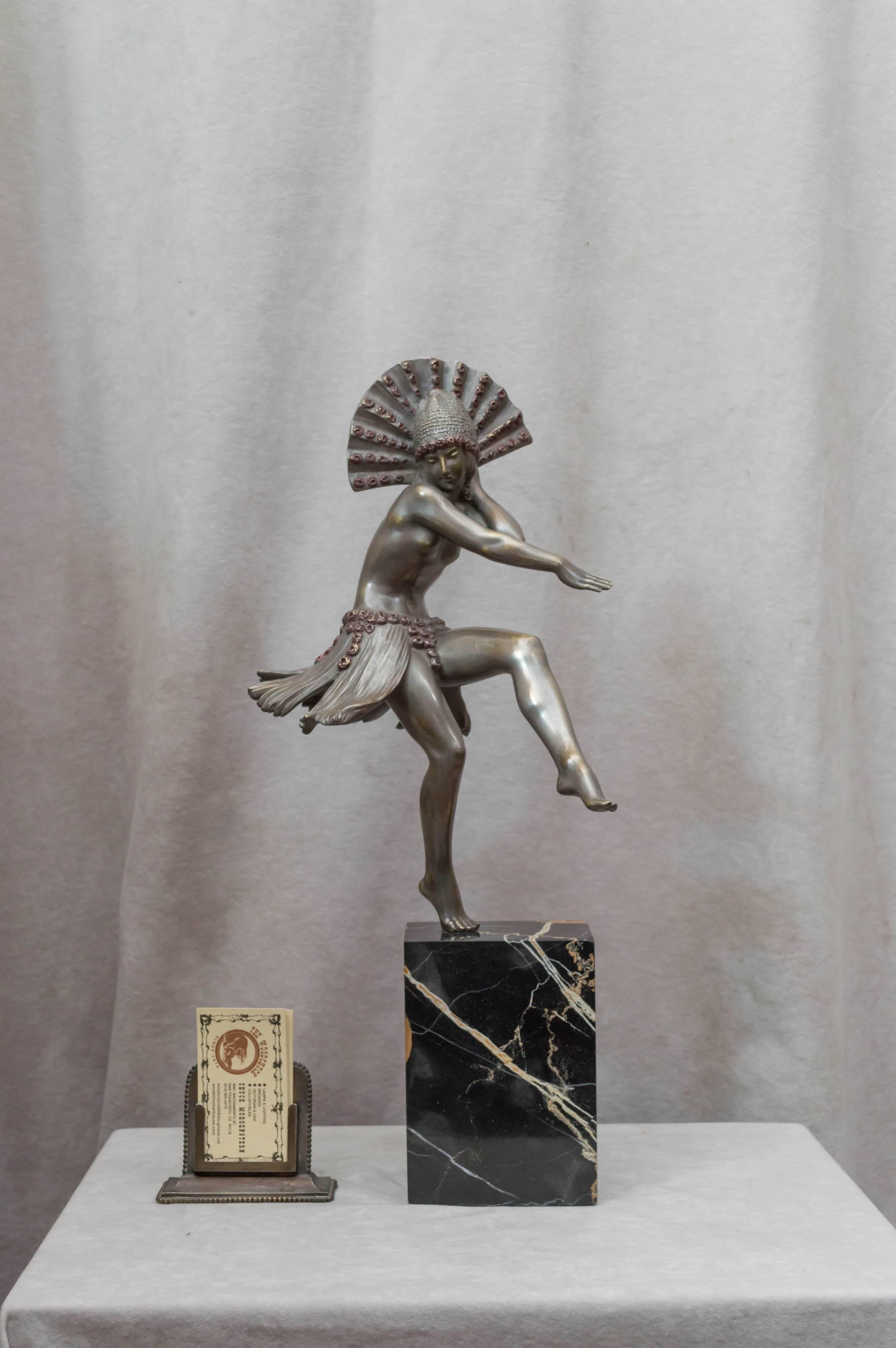 This graceful dancer is artist signed and was done by Fanny Rozet. Ms. Rozet 1881-1958 was born in Paris, winning a medal in 1921. Silvered and polychrome finish bring this sculpture to life. A very high quality Art Deco bronze.