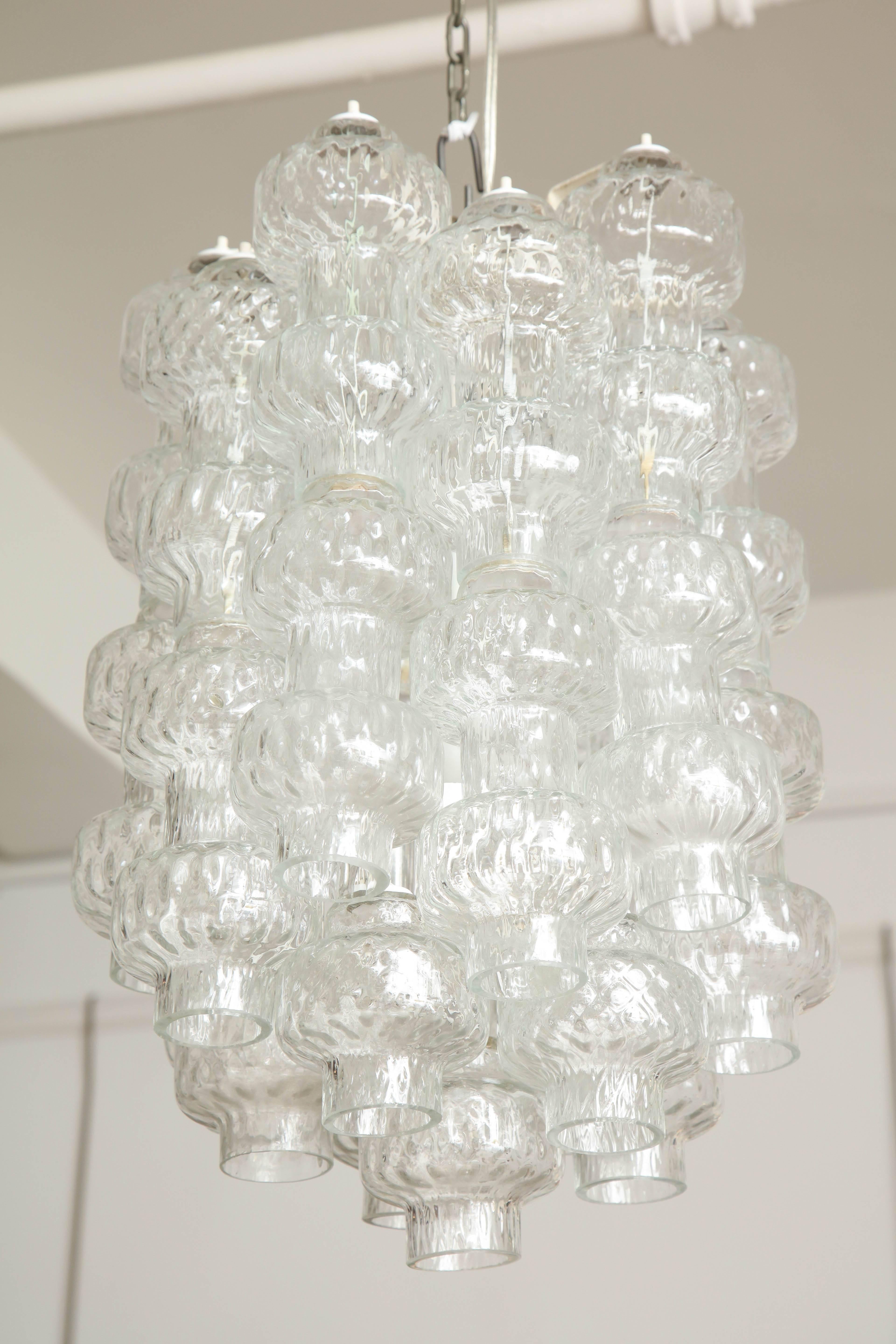 Venini chandelier made in Venice 1960, blown glass sphere's with a diamond pattern in the glass make up the over all design of each sphere, great quality, perfect to hang in a hall stairwell, takes six E14 bulbs.
 