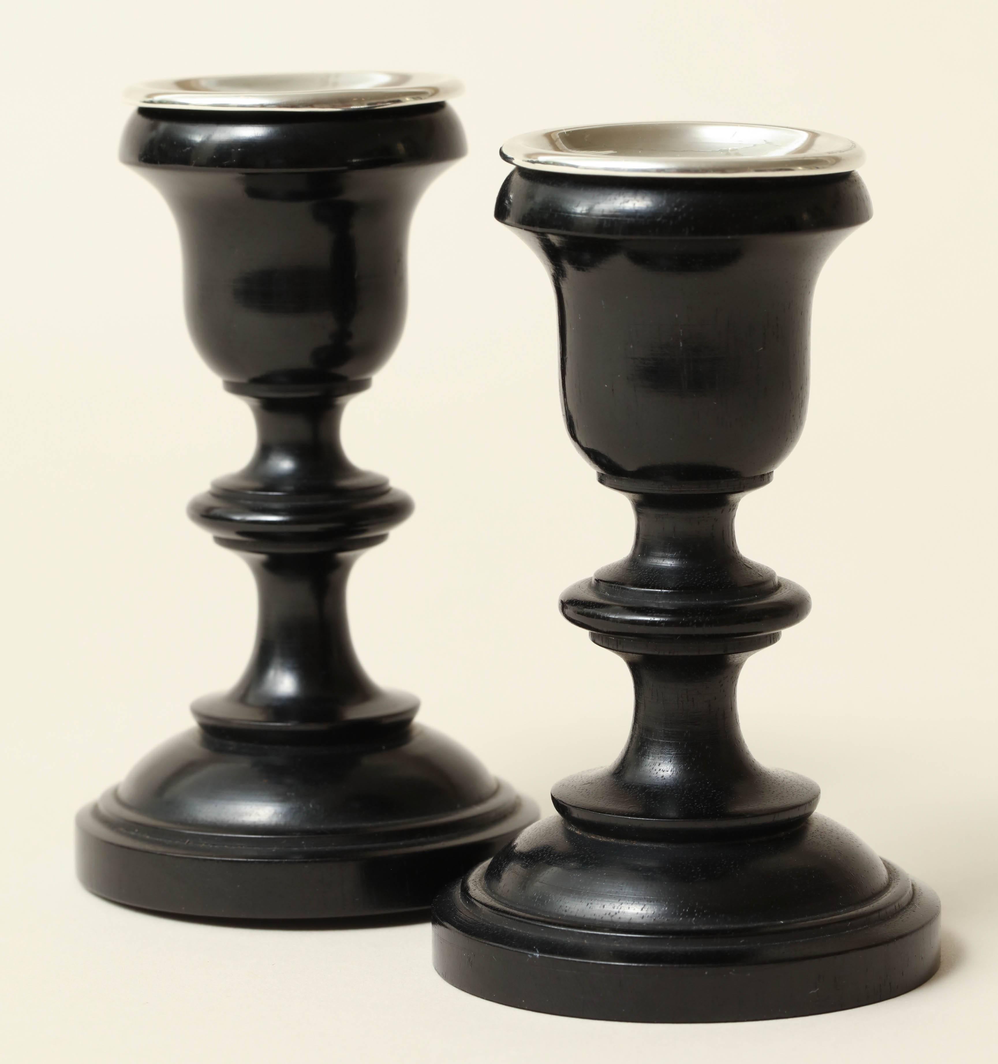 Small ebony candlesticks with sterling silver holders.
Hallmarked for 925 silver/ Birmingham/ 1922/ V &St. J.

(Price shown is reduced price, no further trade discount) 