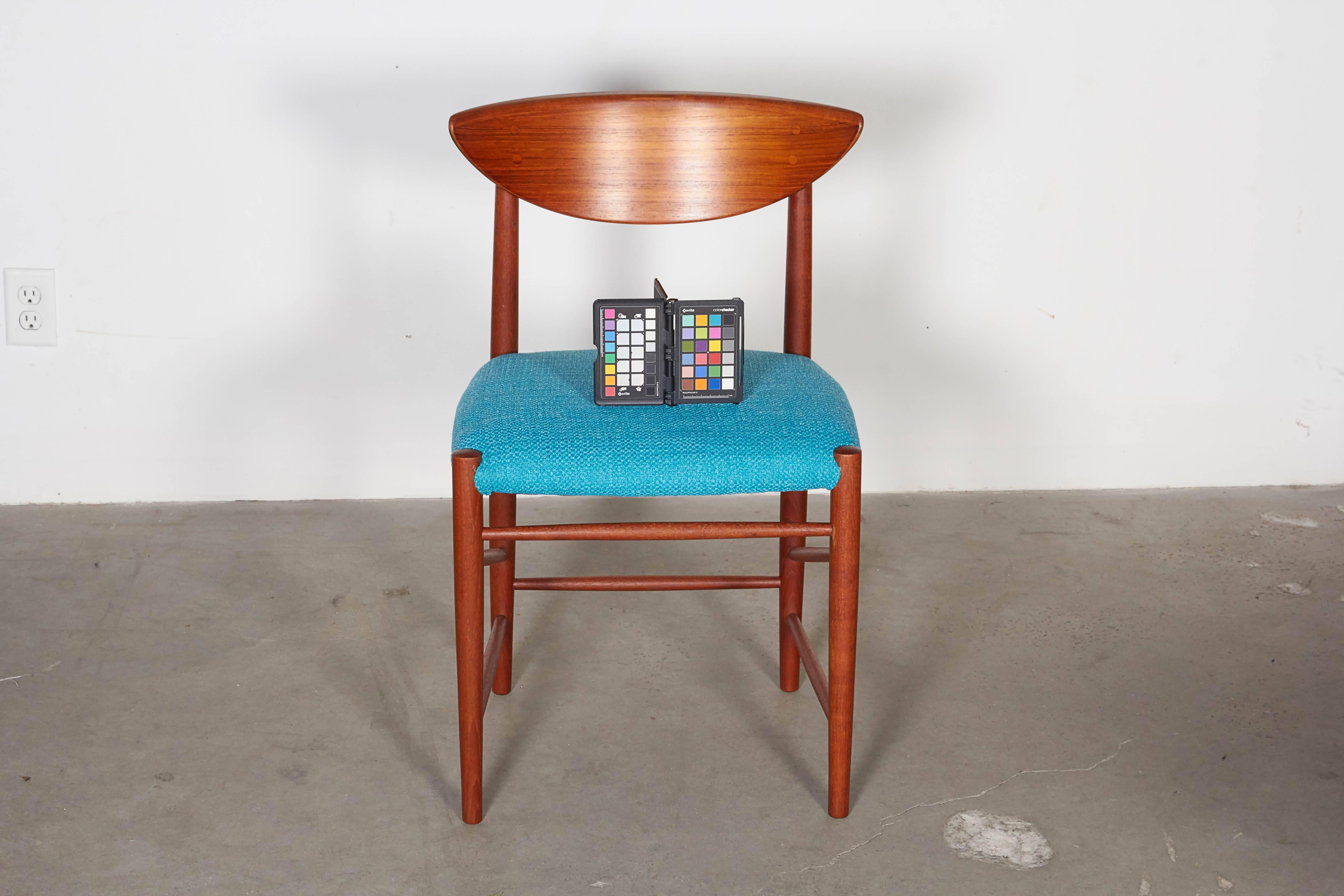 Vintage 1950s Hvidt & Molgaard Teak Dining Chairs

These mid century dining chairs are in excellent condition. Newly upholstered in this re-issued aqua fabric from the 1950s. Ready for pick up, delivery, or shipping anywhere in the world. 