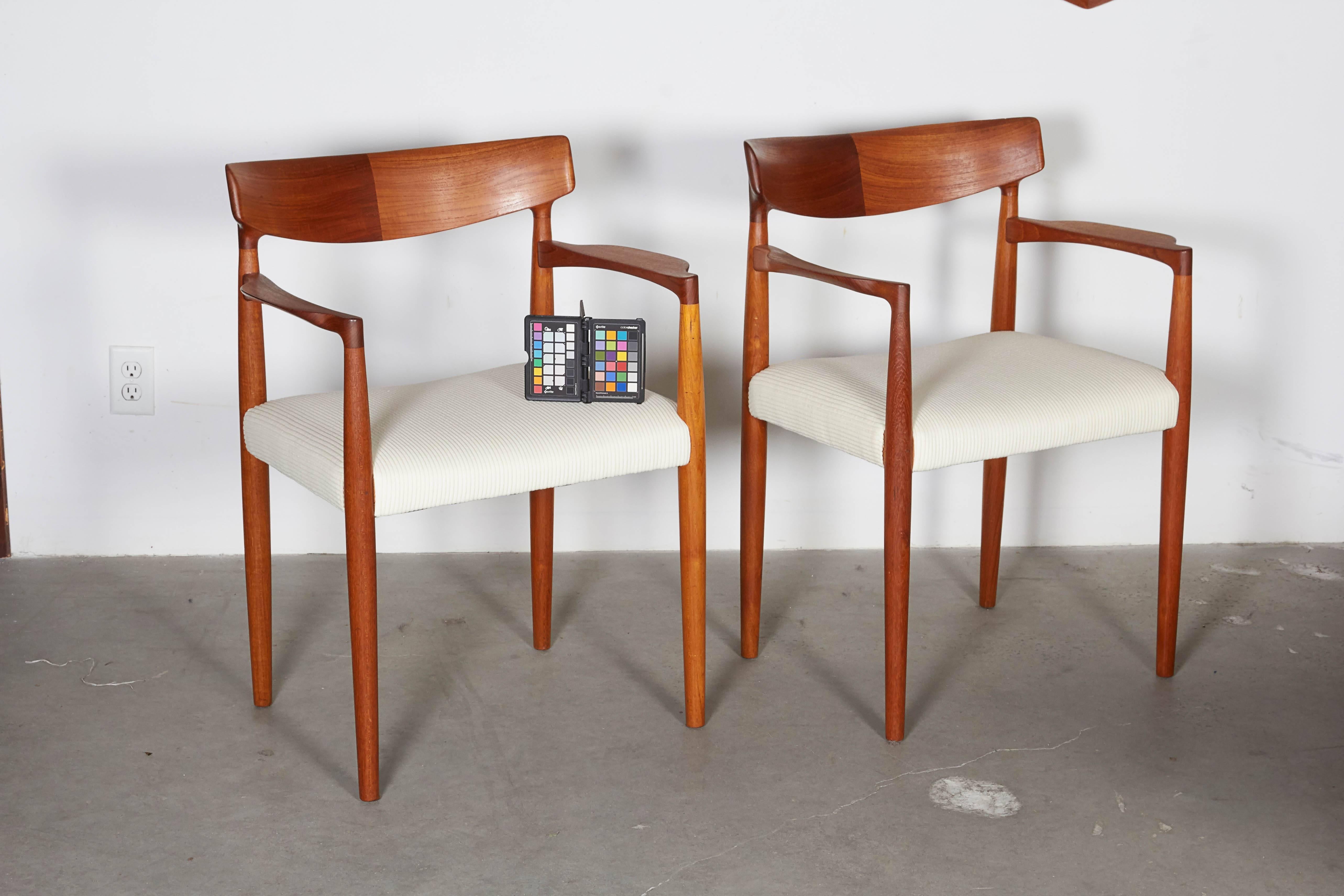 Vintage 1960s Teak Occasional Chairs, pair
 
Dual Stain Teak Wood gives this chair the best of both hues. The contrasting stains on this chair certainly adds some character, couple this with the organic arms and conical legs and we have a winner.