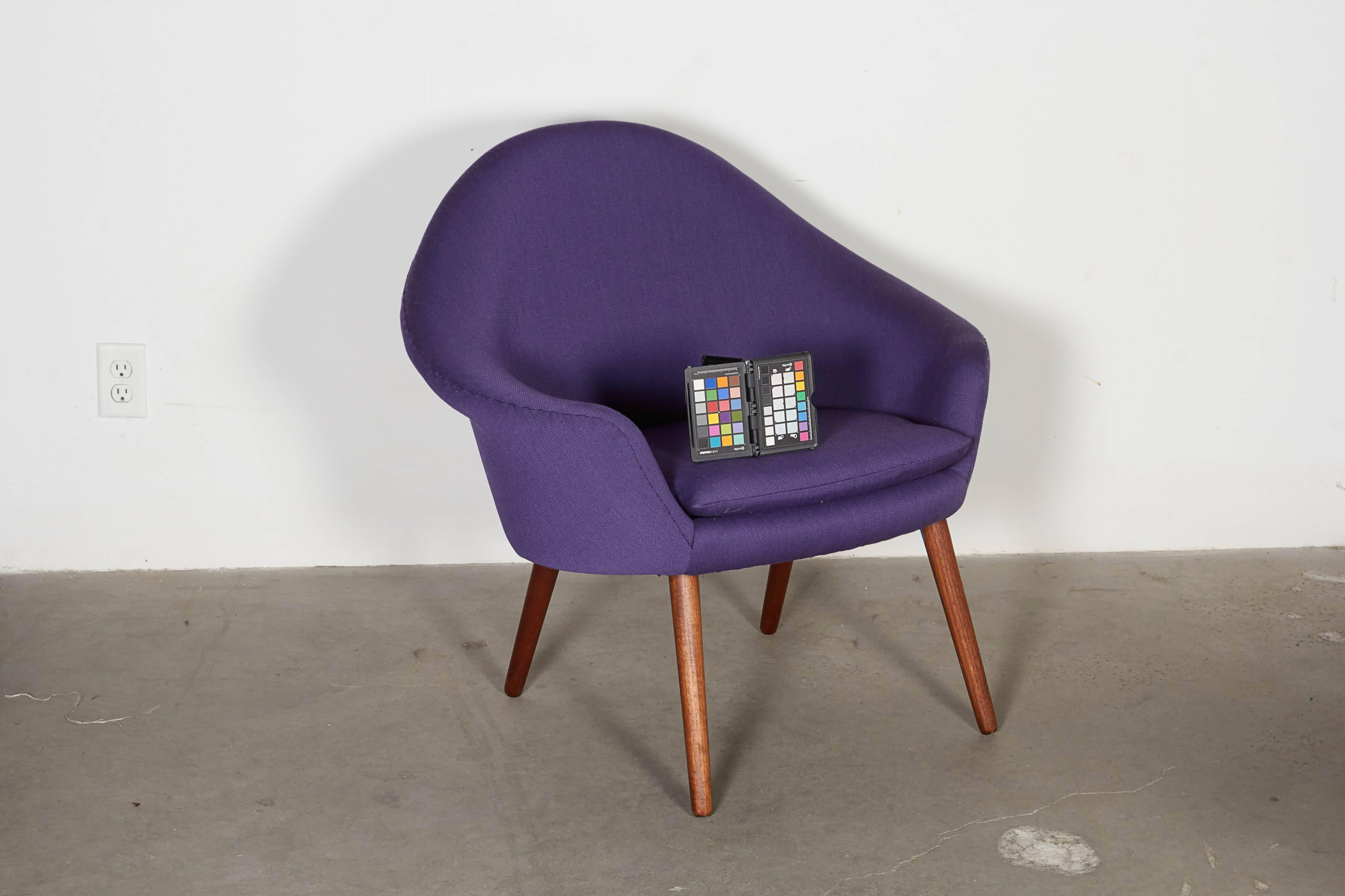 Vintage 1960s Danish Purple Chair

This mid century womb chair is in excellent condition. Very comfortable and newly upholstered. Great size, will fit in almost any room. Ready for pick up, delivery, or shipping anywhere in the world.