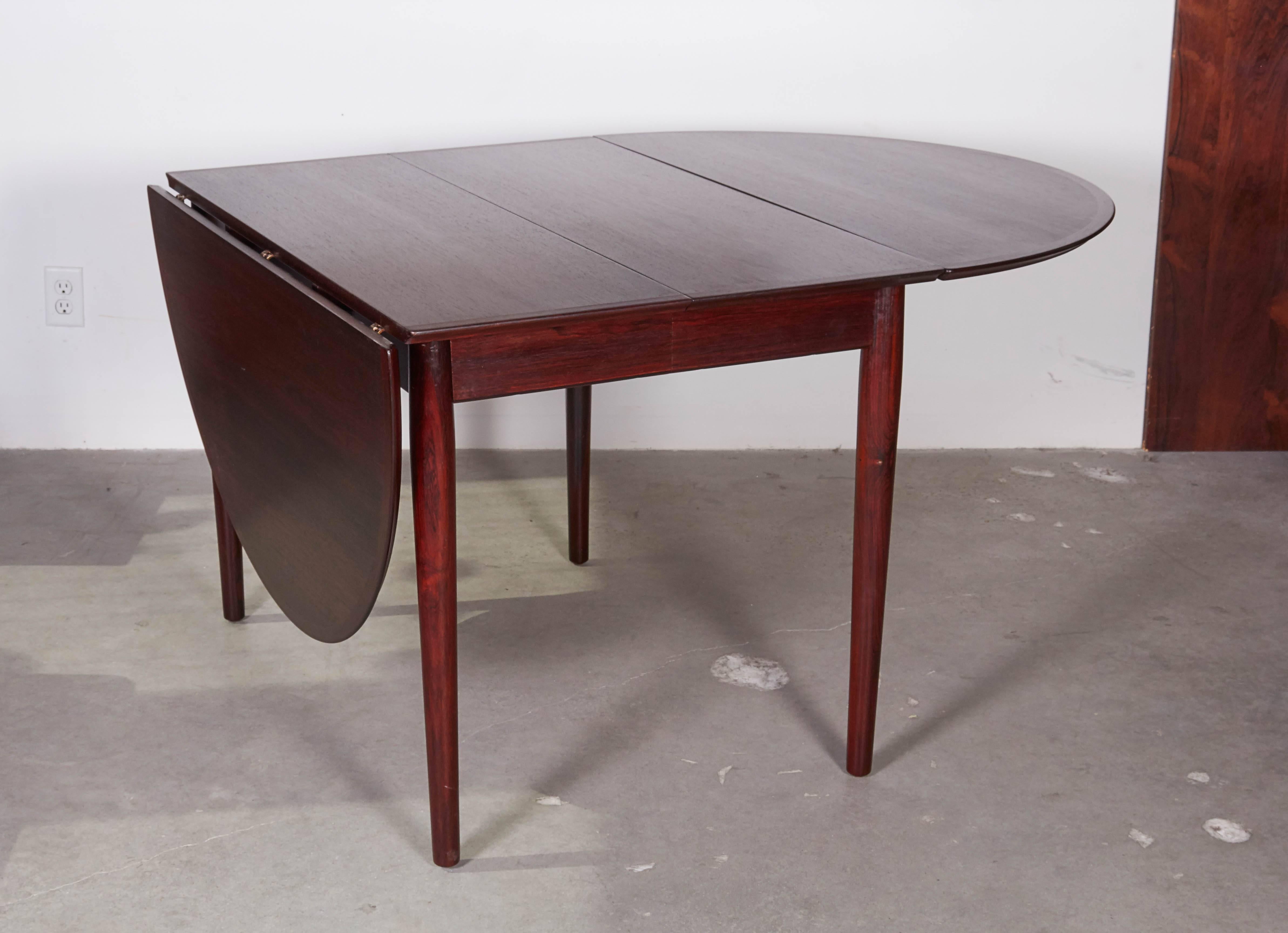 Danish Rosewood Dining Table by Arne Vodder