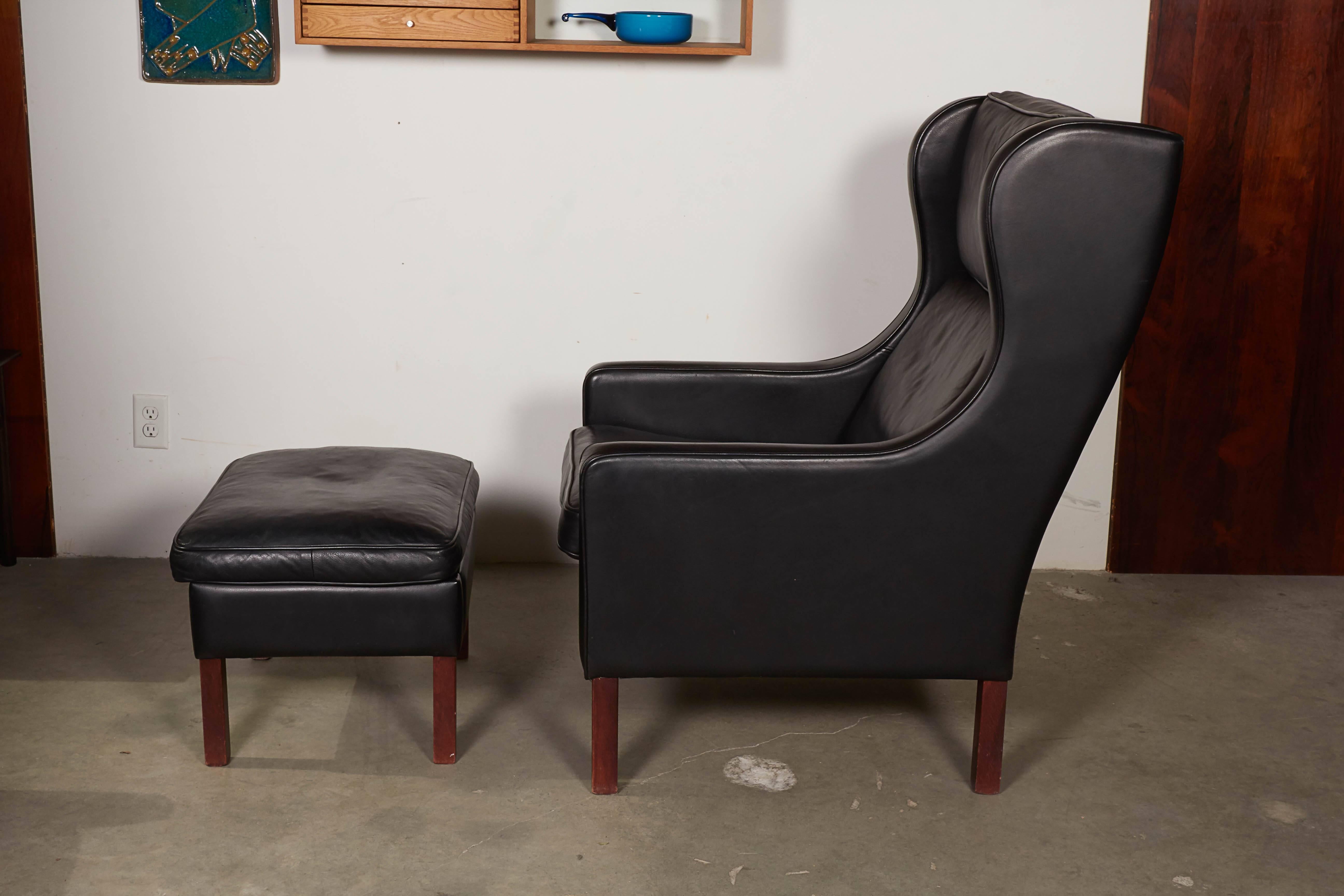 Mid-20th Century Mid Century Leather Wingback Chairs with Ottoman