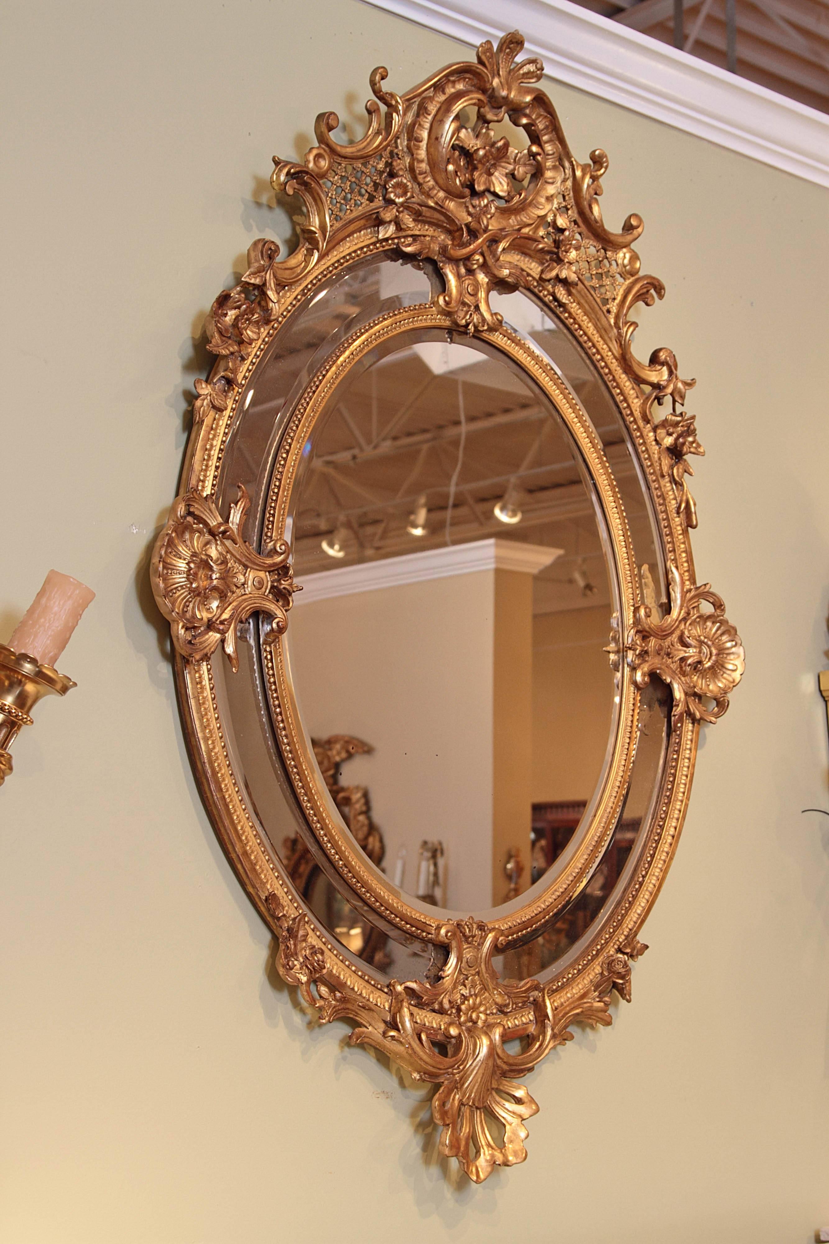 19th Century French Louis XV Fine Gilt Carved Oval Mirror In Excellent Condition In Dallas, TX