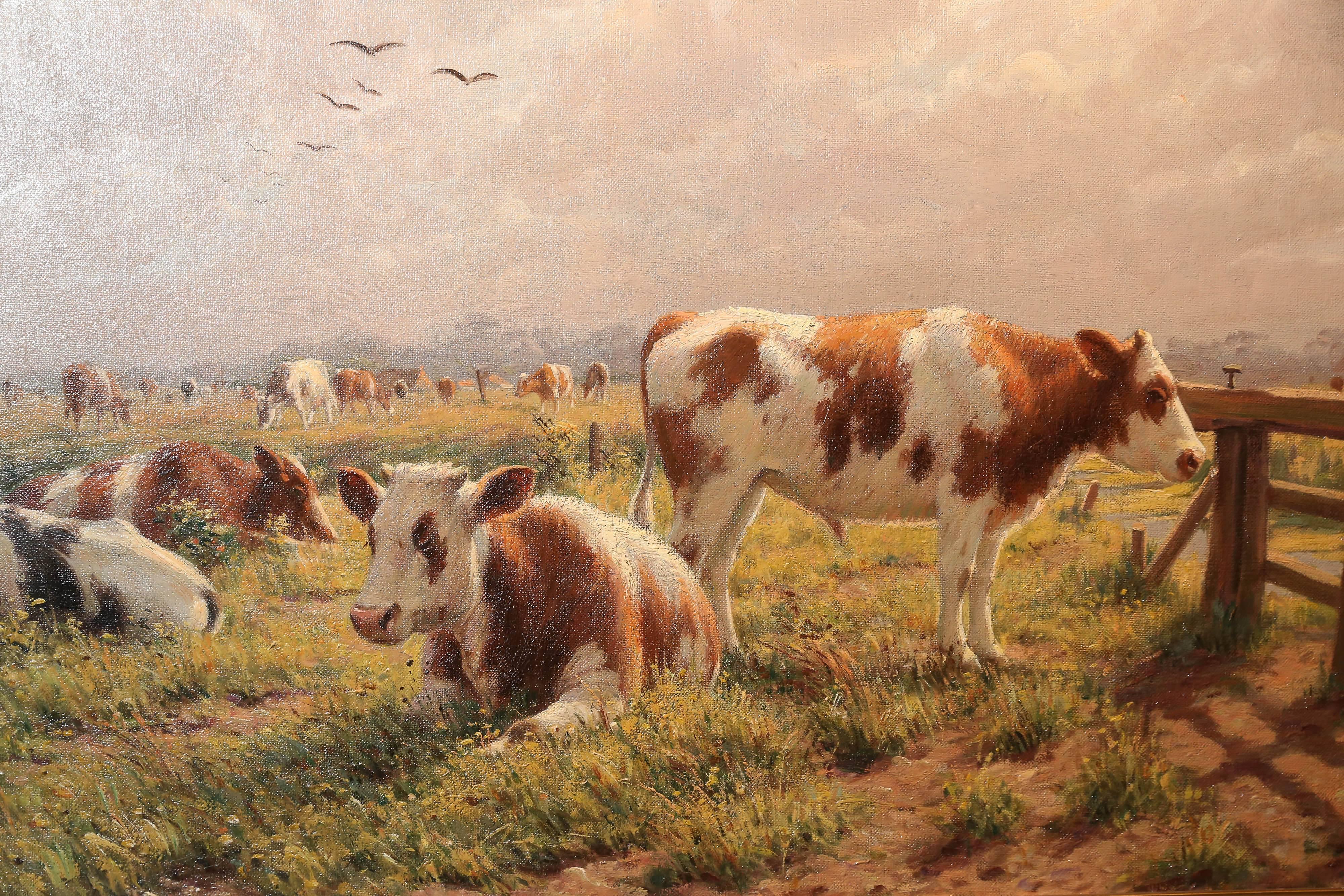 Well painted work by Albert Caullet (Belgian, 1875-1950) a 
Handsome Landscape of cattle grazing in a field with a fence.
The frame is in great condition and is in a beautiful gold hue.
