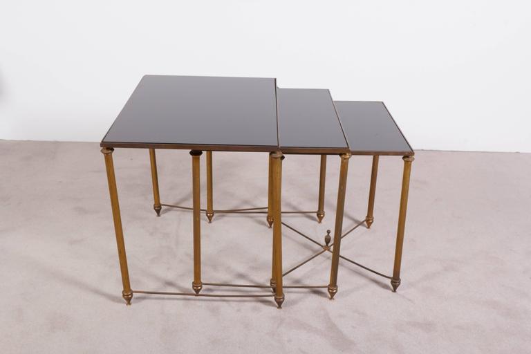 Neoclassical Black Glass Top Bronze Nesting Tables, Manner of Maison
