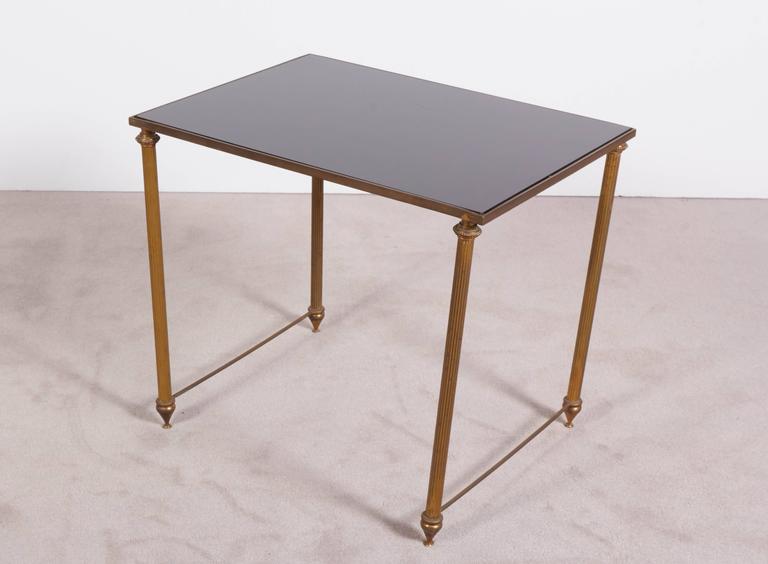 Neoclassical Black Glass Top Bronze Nesting Tables, Manner of Maison