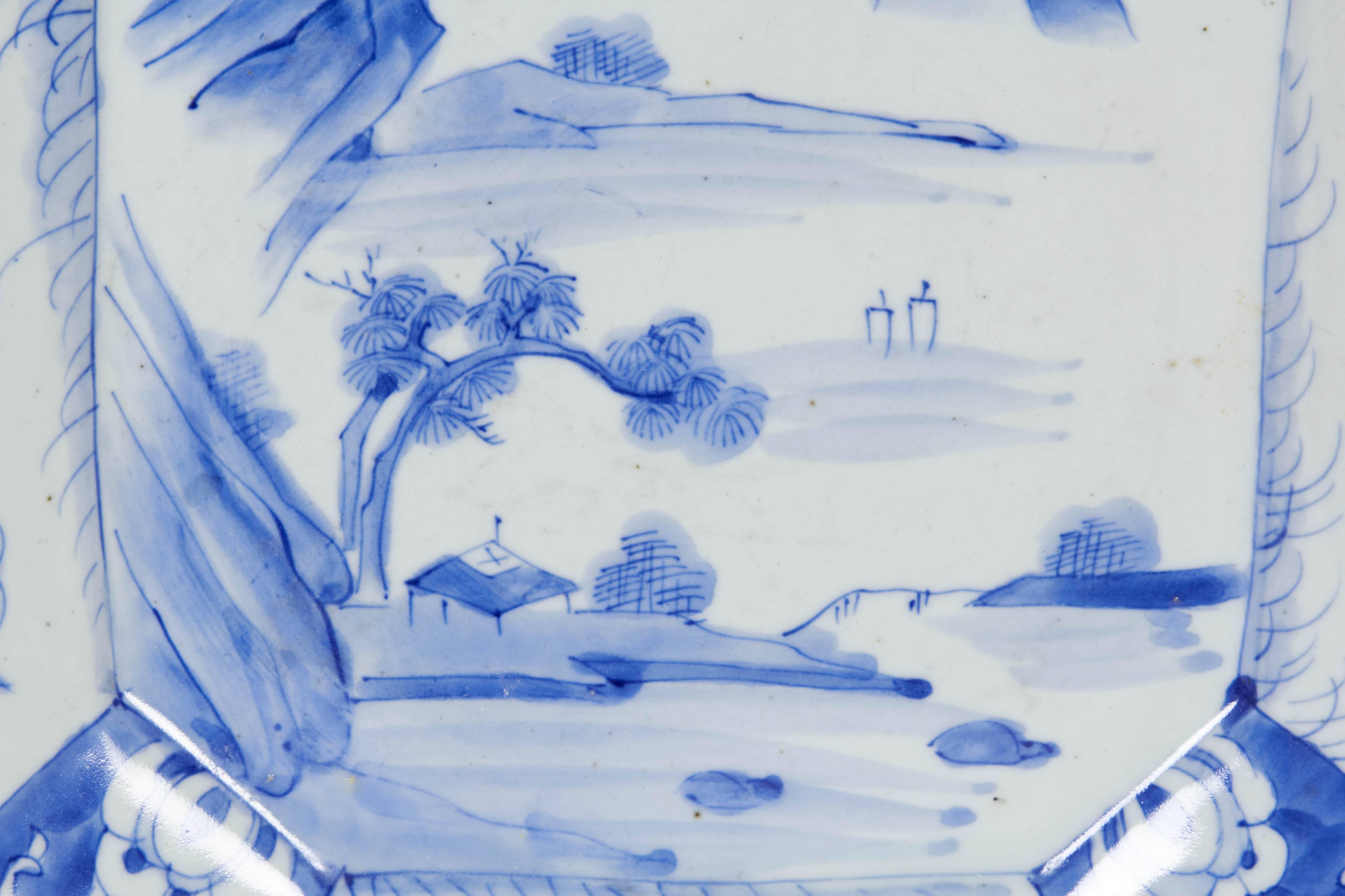 Japanese octagonal plate, produced early 20th century, in glazed blue and white porcelain, hand-painted with a mountainous landscape; unmarked. Very good vintage condition, minuscule chips consistent with age.

11099