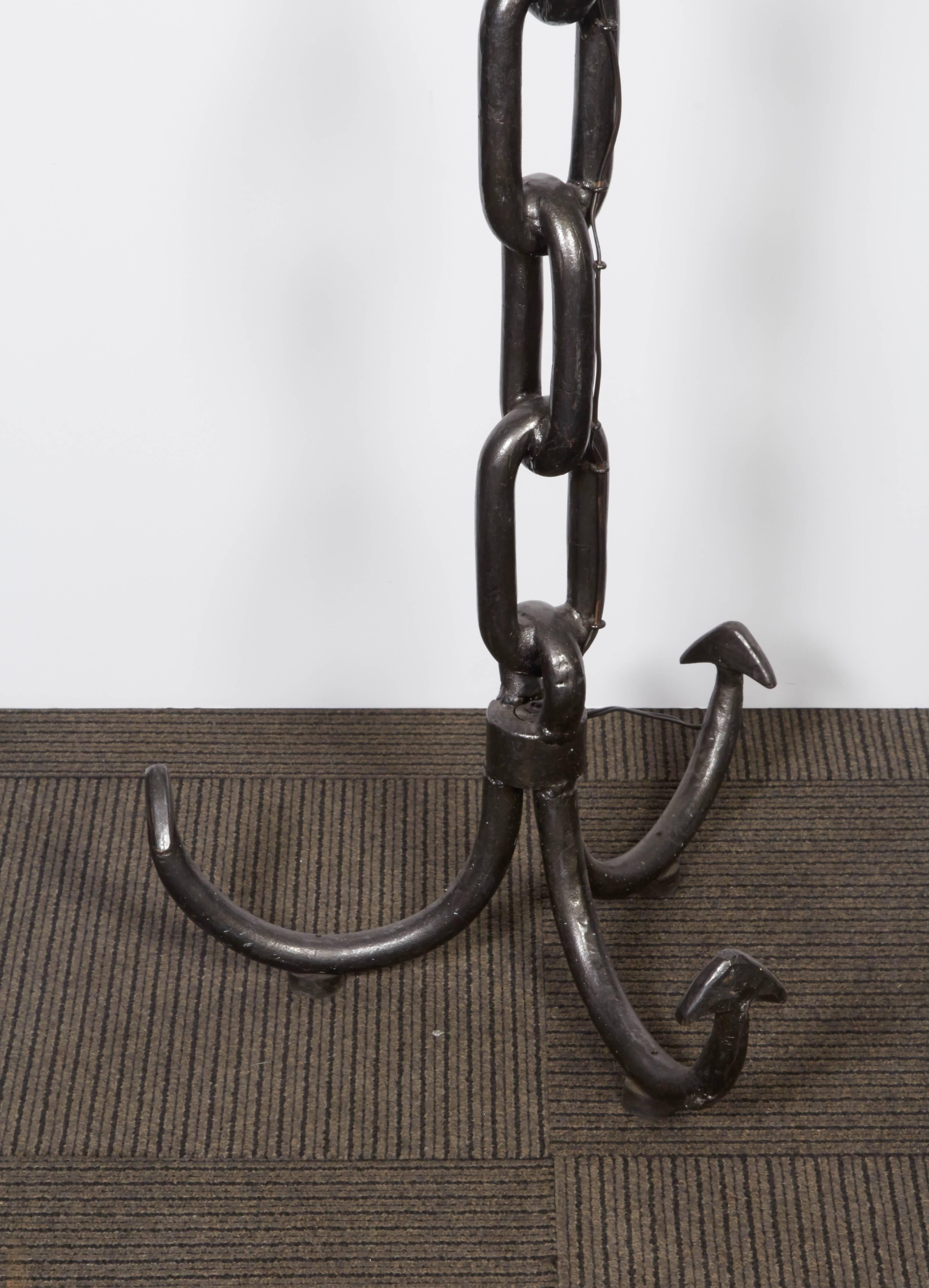 An iron grappling hook as floor lamp, produced in France, circa 1940s. Excellent vintage condition, newly rewired.

11048