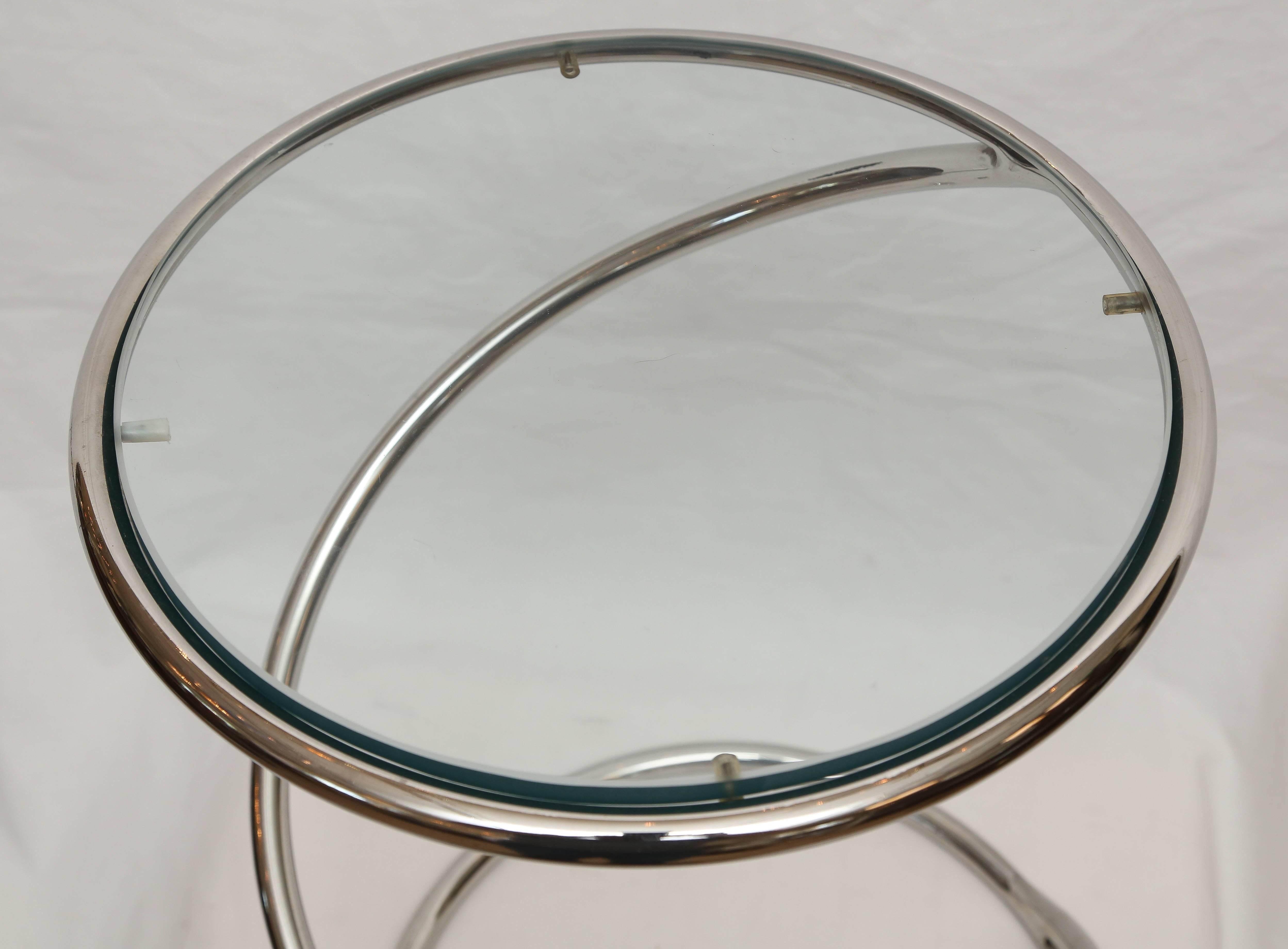 Striking spiral chrome and glass top side tables designed by Milo Baughman for the Pace Collection.
These tables bring fun and add Mid-Century flair to any room.