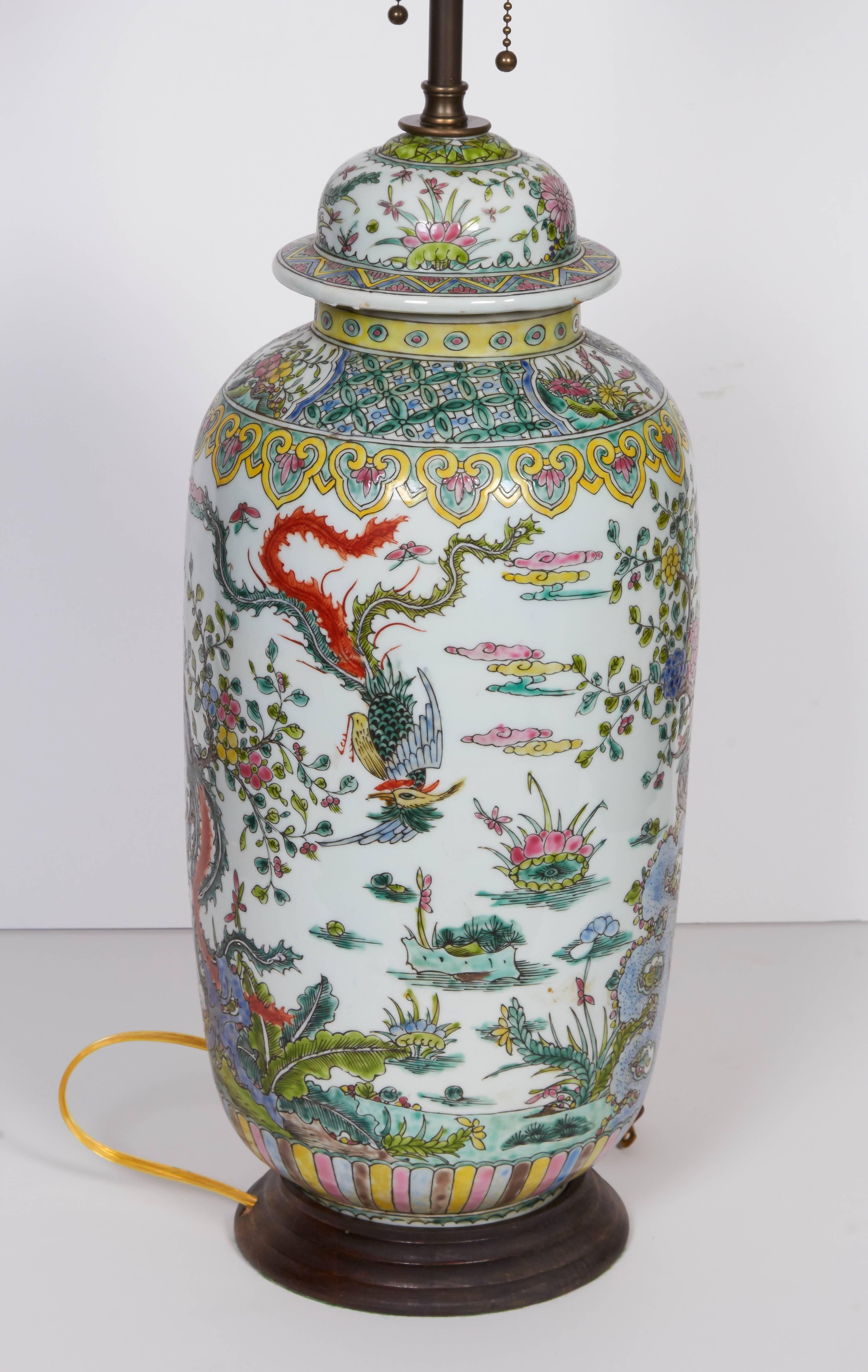 A pair of Chinese porcelain Famille Verte urns fitted as lamps 2