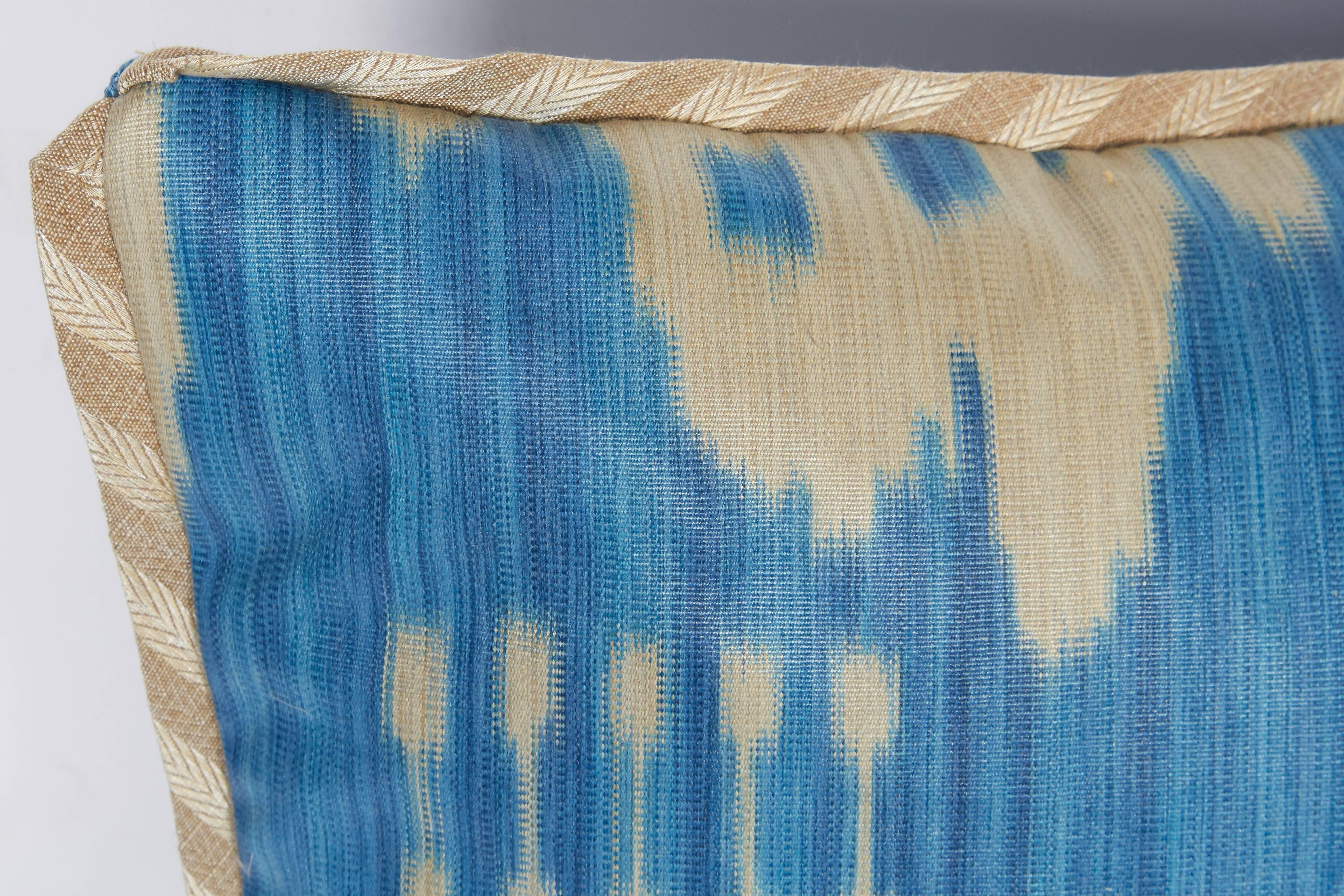 A single Ikat fabric cushion, with silk blend bias trim and linen backing. Newly made using vintage fabric, circa 1960