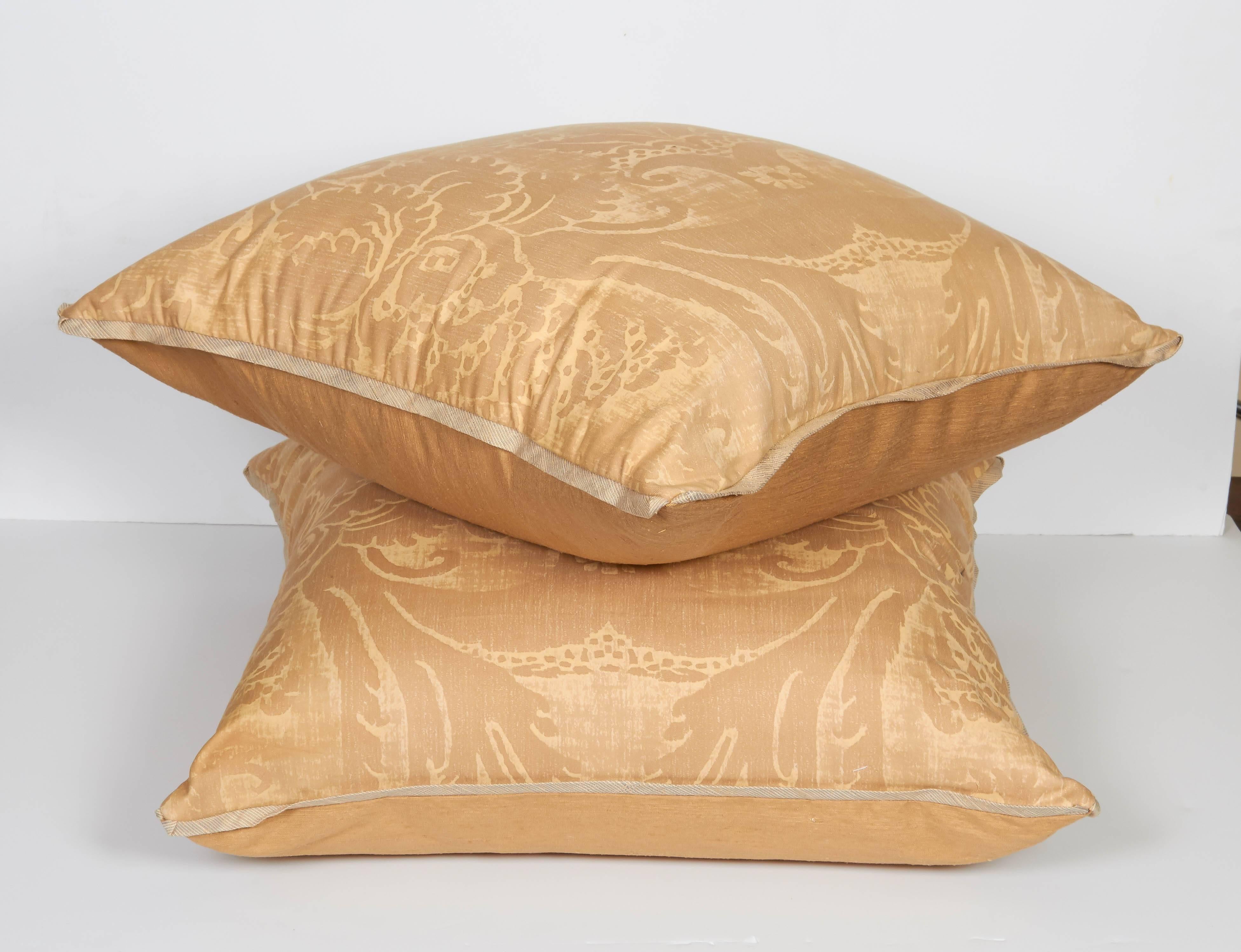 A pair of Fortuny fabric cushions in the Glicine pattern, beige and sand color way with silk bias edging and silk blend backing material, the pattern, a 17th century Italian design with wisteria motif. Newly made using vintage Fortuny fabric, circa