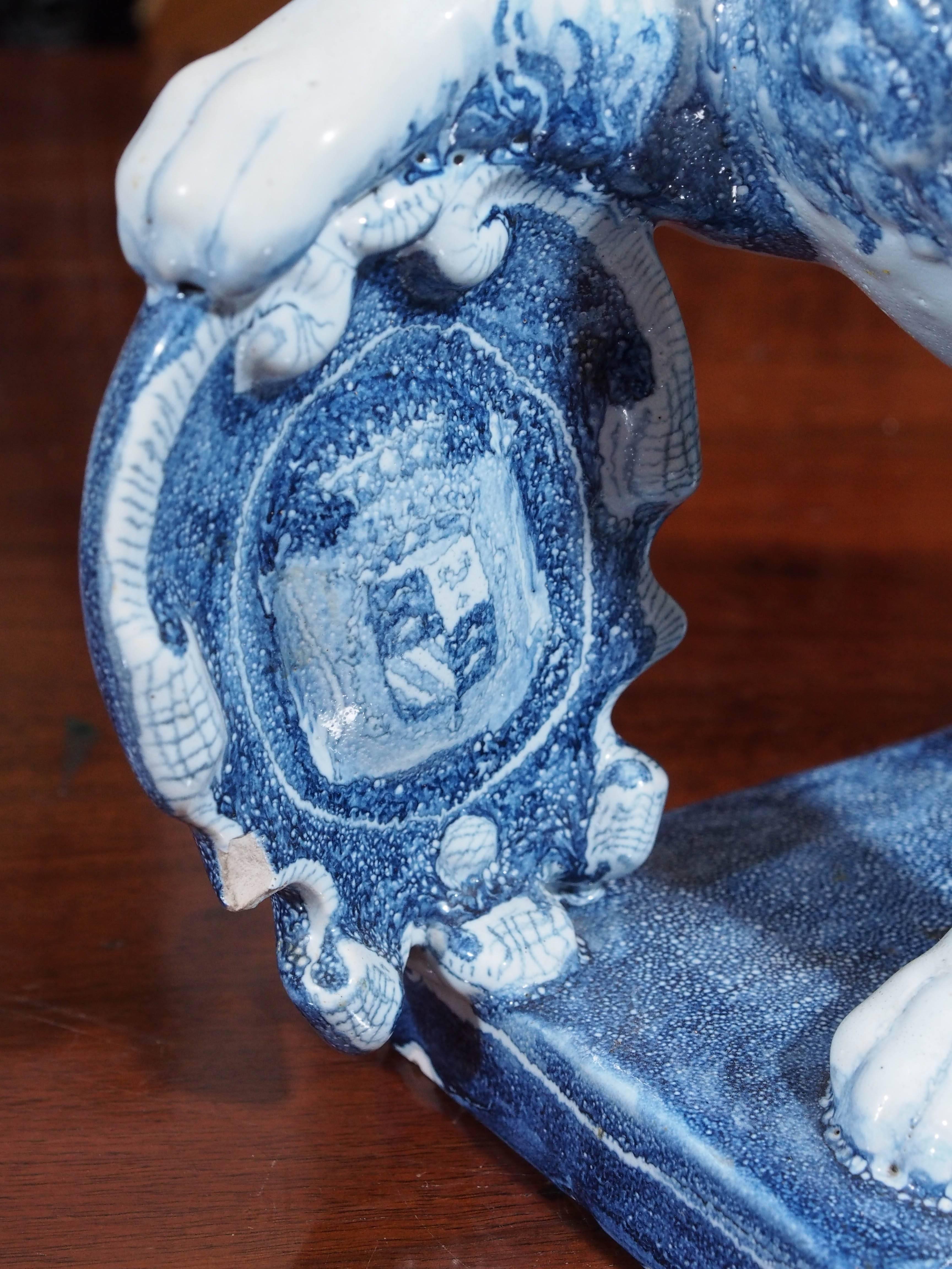 Pair of Blue and White Delft Lions with Shields In Good Condition For Sale In Natchez, MS