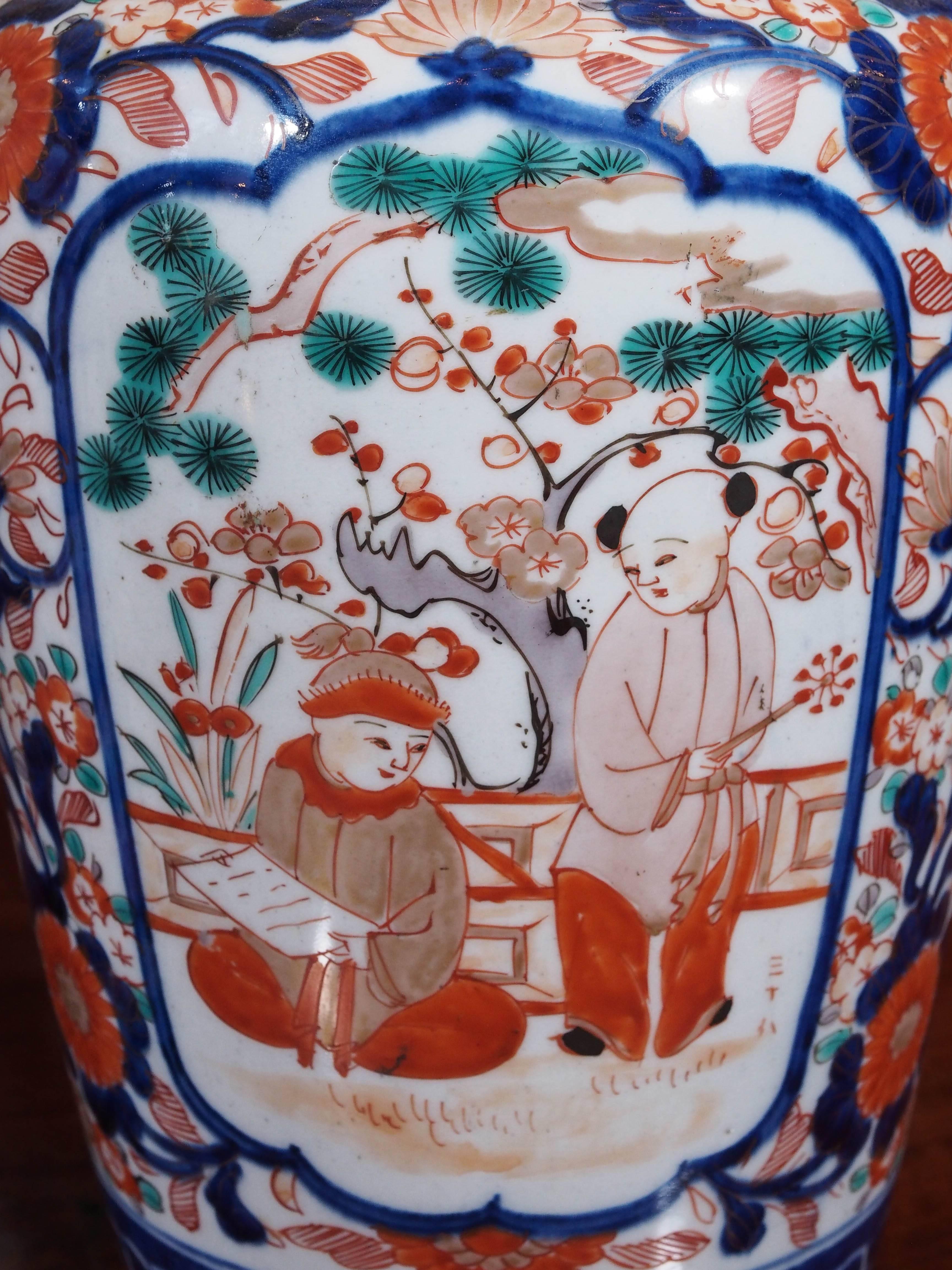 Japanese Pair of Imari Ribbed Jars with Small Boys in a Garden