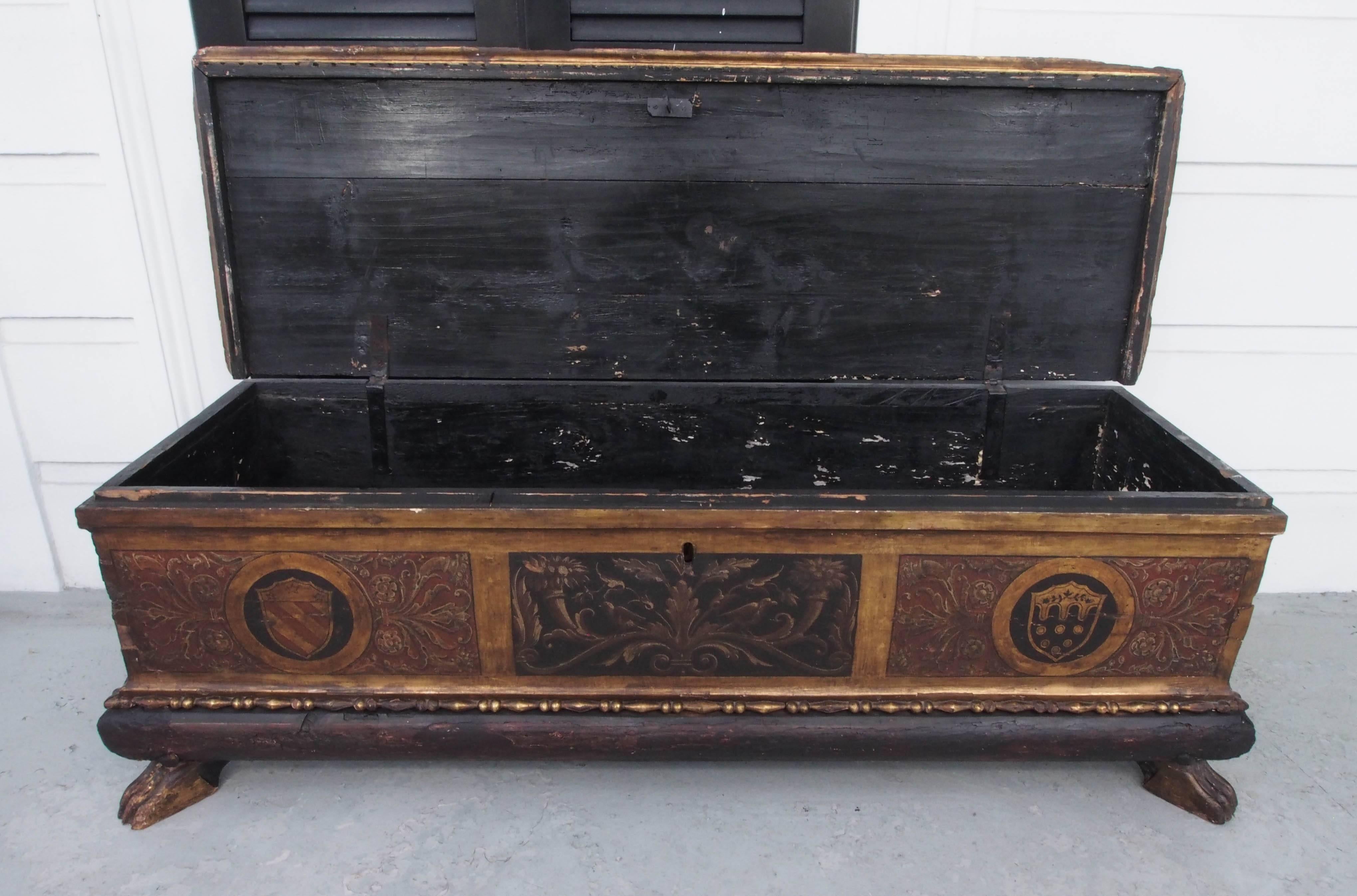 18th century Italian painted wood cassone with paw feet.