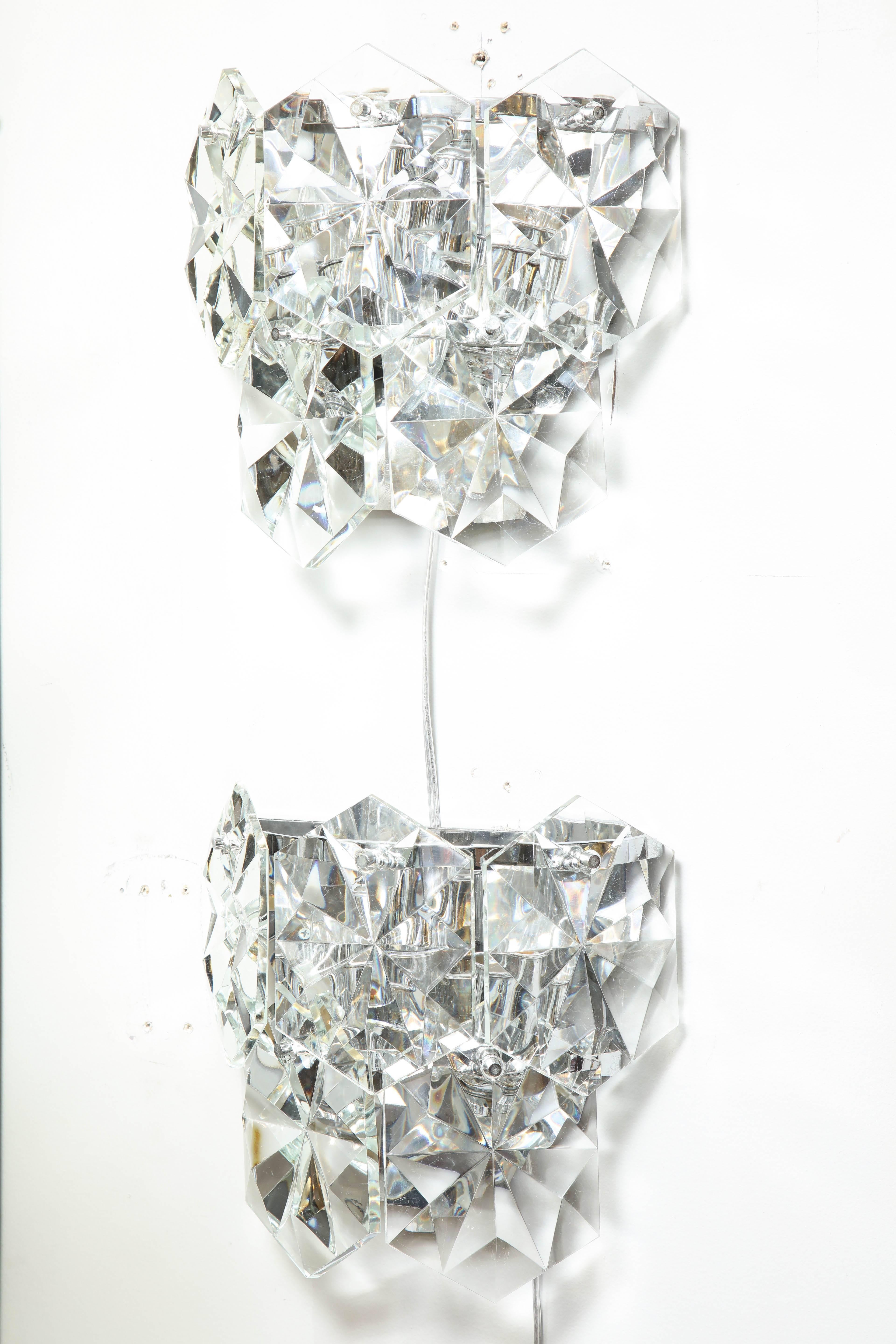 Pair of glamorous oversized crystal and chrome sconces by Kinkeldey. Austria 1970's