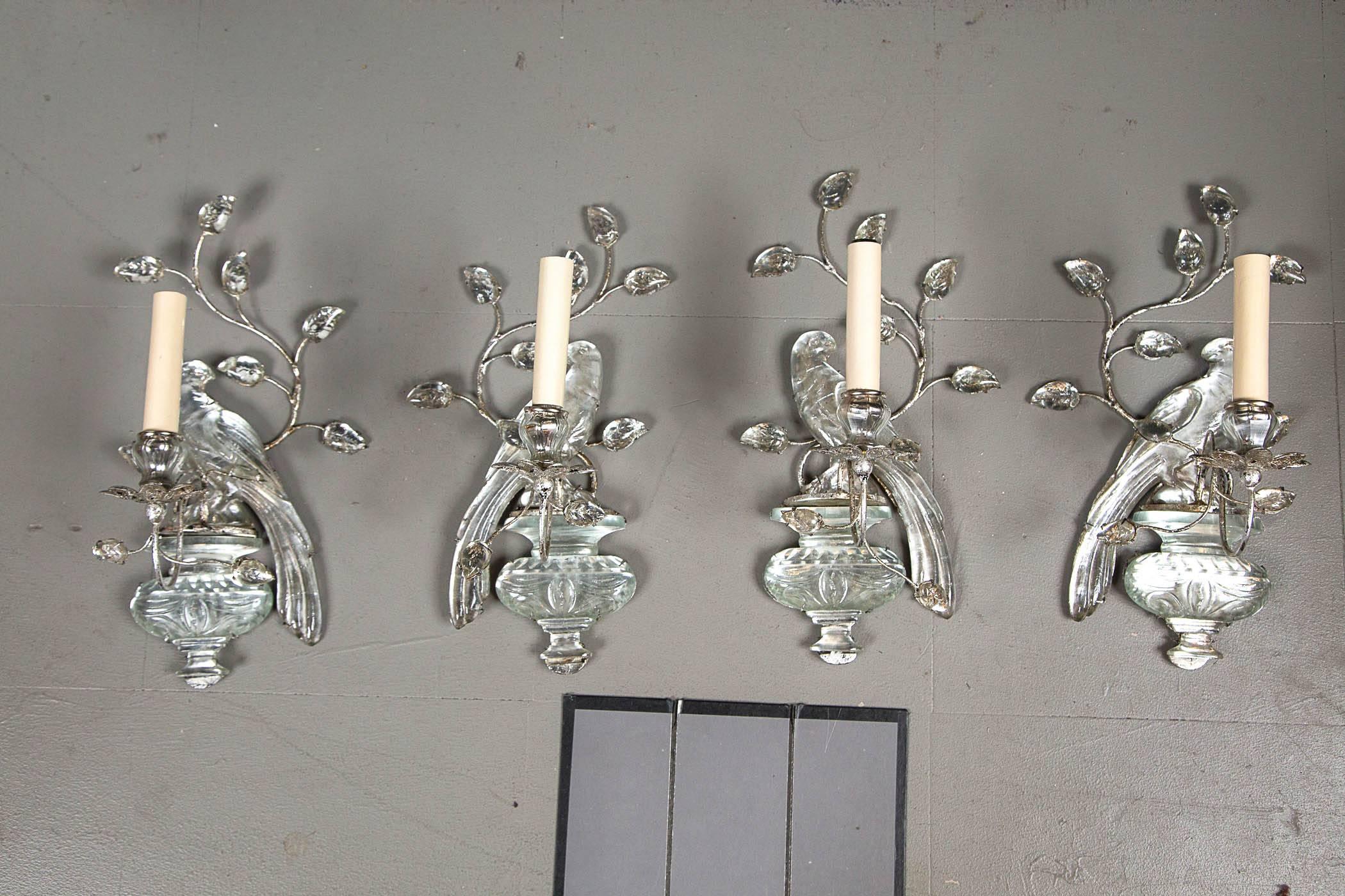 Set of four circa 1930s French Maison Baguès one light sconces with bird design.