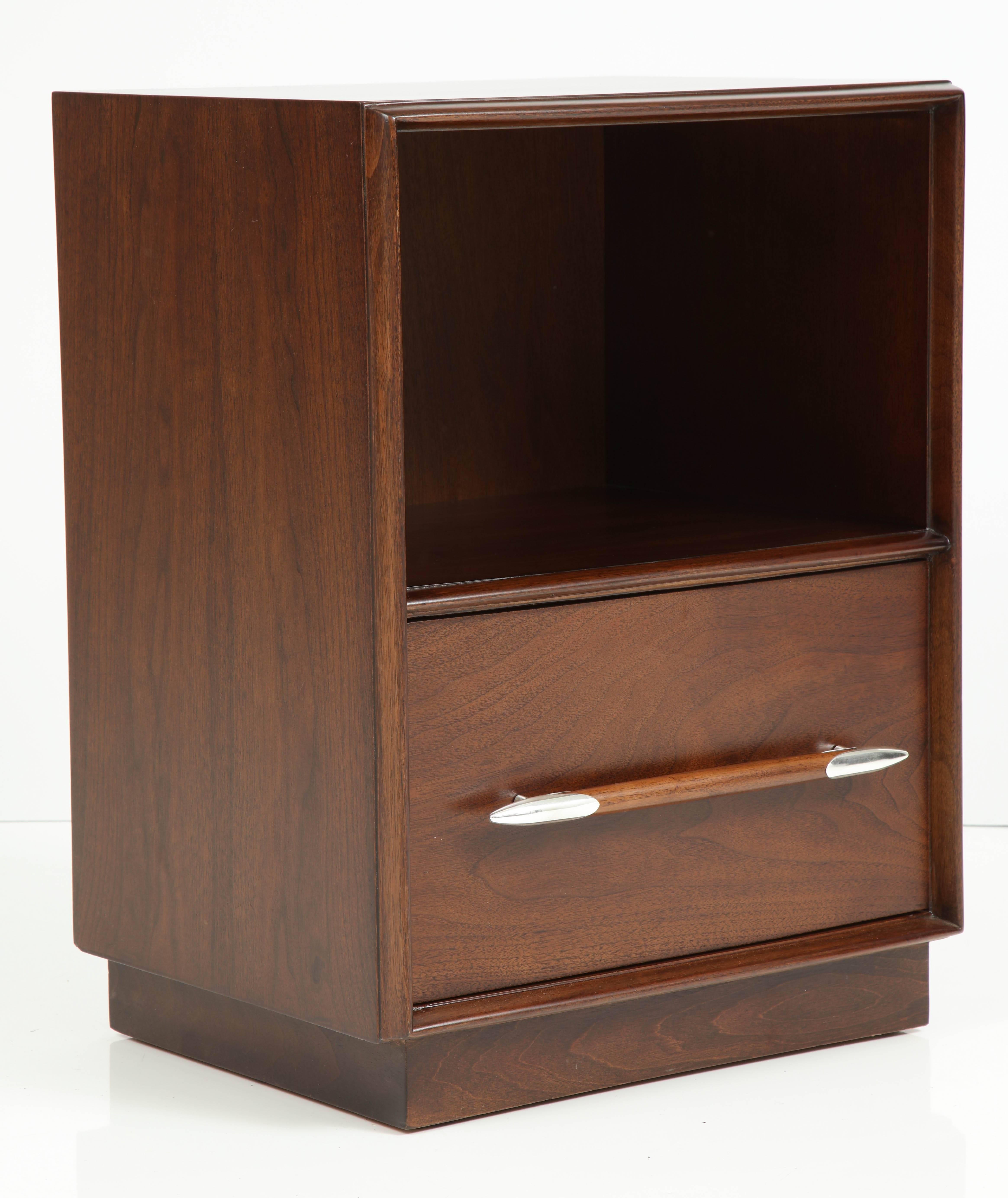 Pair of Mid-Century Classic spear handle nightstands designed by T.H. Robsjohn-Gibbings for Widdicomb. Nightstands have been mint restored with a rich tobacco brown stain and polished nickel points.