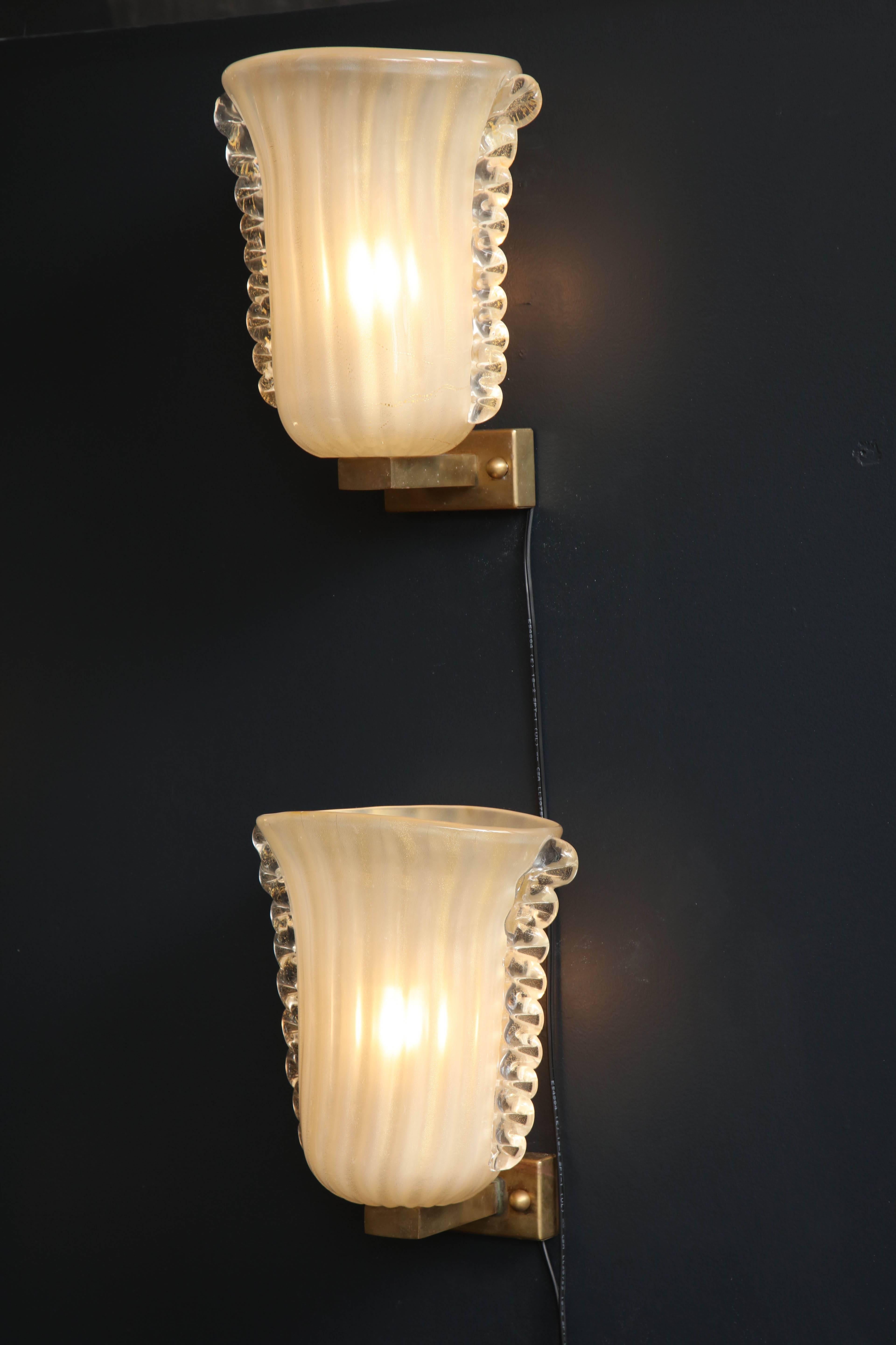 Mid-Century Modern Pair of Italian Ivory with Infused Gold Murano Glass and Brass Sconces