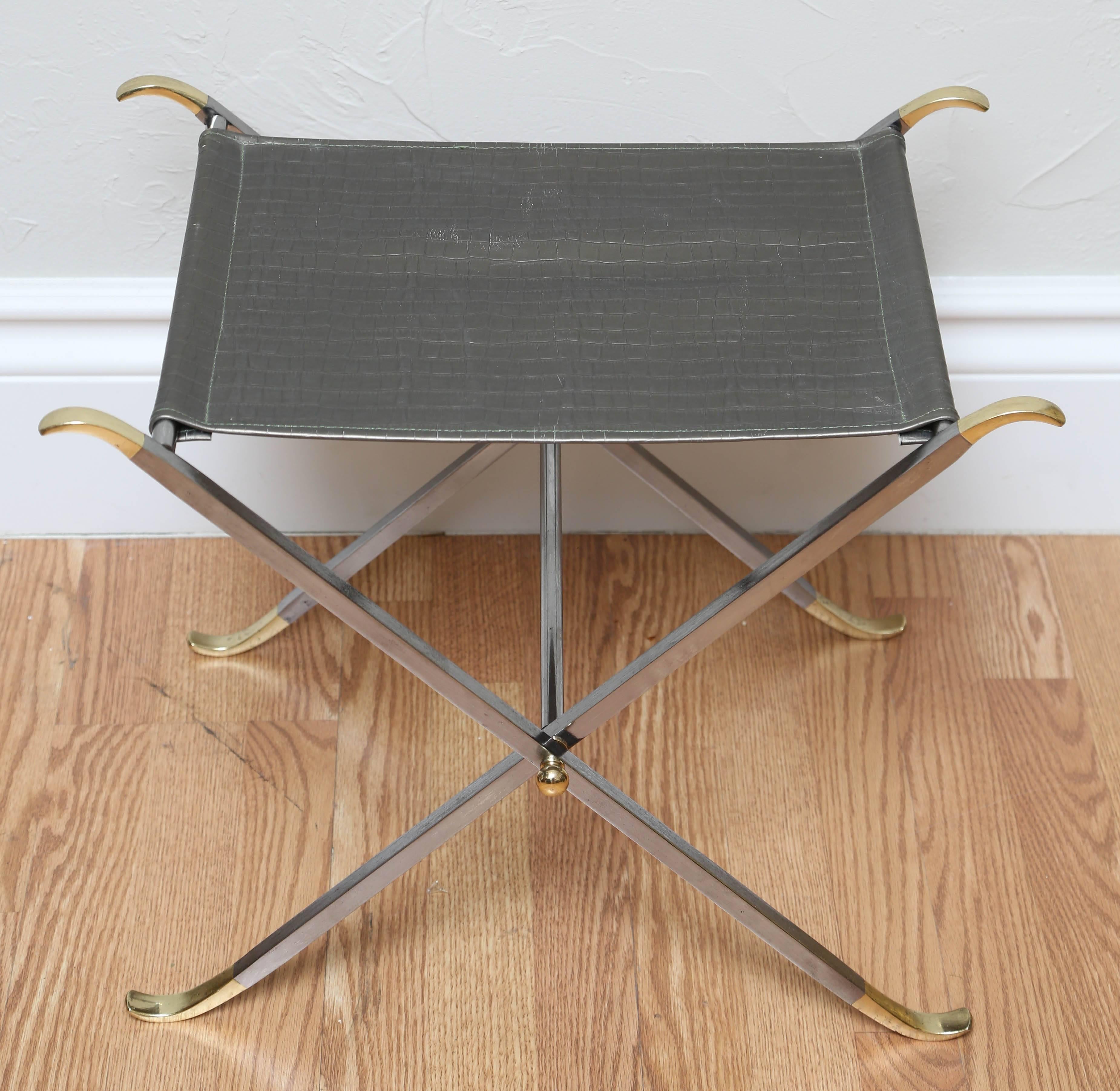 Pair of folding steel and brass Campaign stools with faux crocodile seats.